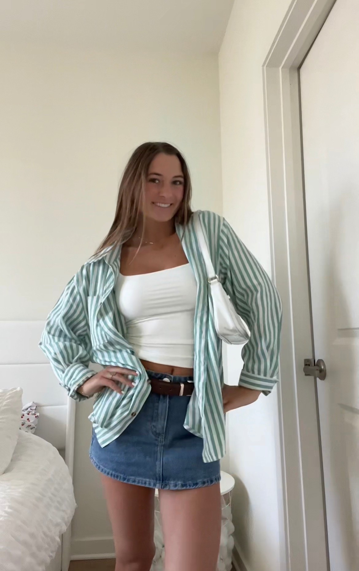 wearing a size M in the button down, small in the tank and skort!