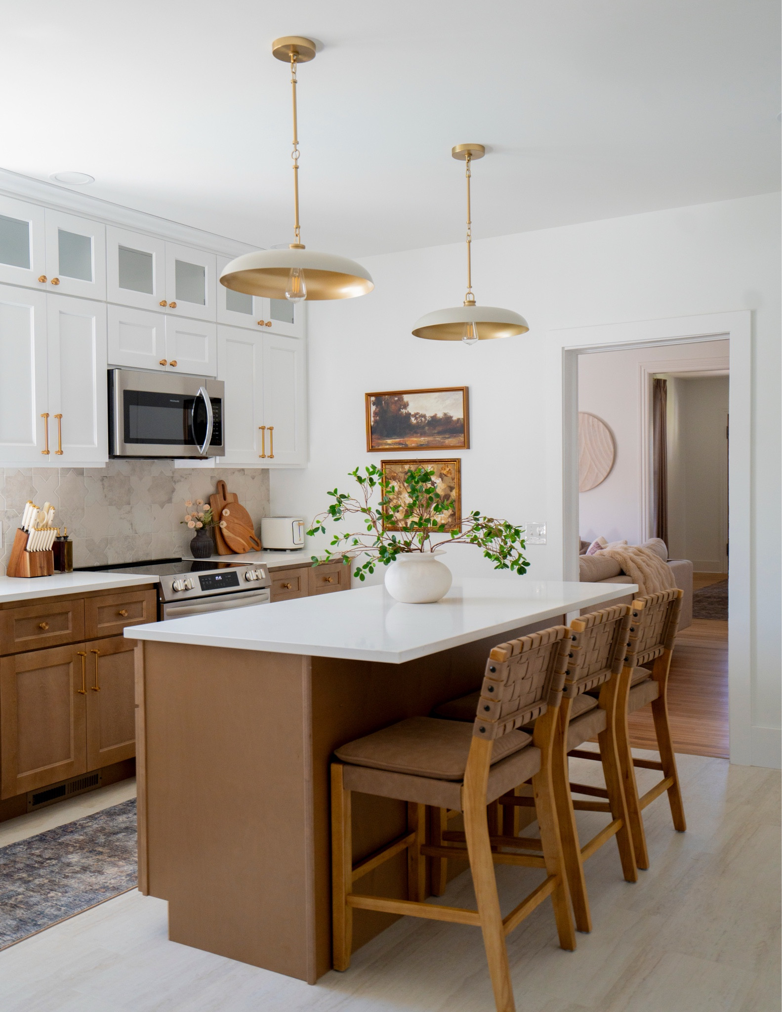 Our finished Airbnb kitchen! The cabinets are from RTA Cabinets — top is Weston White & bottom is Florence Honey. 

#kitchenmakeover
#Airbnb
