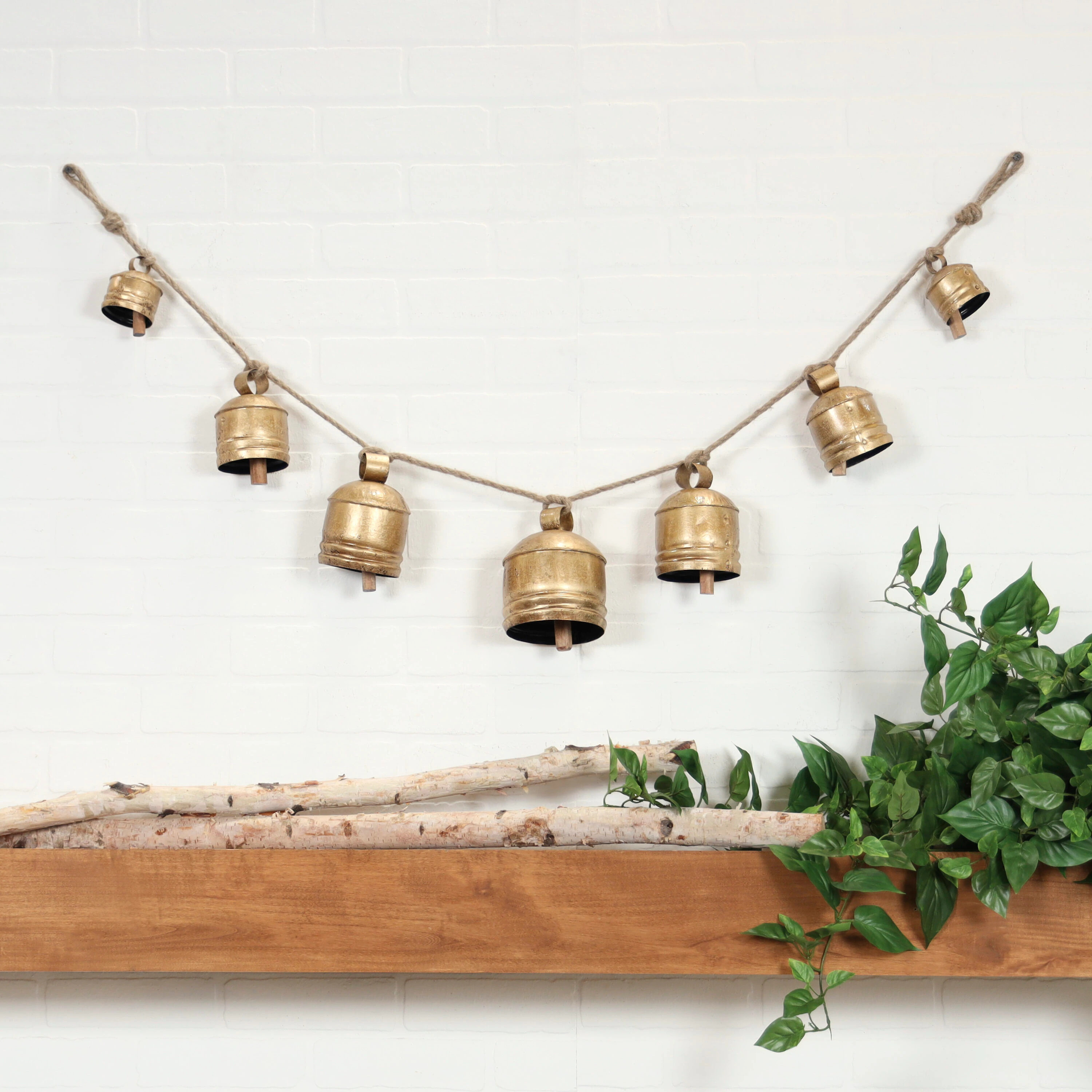 Grayson Lane 53-in W x 6.5-in H Metal Decorative Bells Bohemian Wall Sculpture in Gold | 821623 | Lowe's