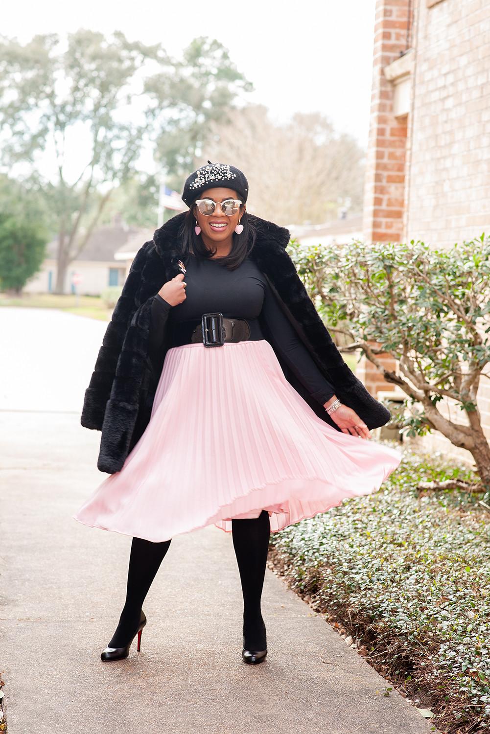 Go to your next Holiday or Christmas party in a show stopping outfit. I love this classic pleated skirt with my favorite faux fur and accessories 

#LTKHoliday #LTKootd #LTKFindsUnder50
