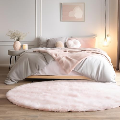 Super Area Rugs ultra soft fluffy faux sheepskin rug in light pink