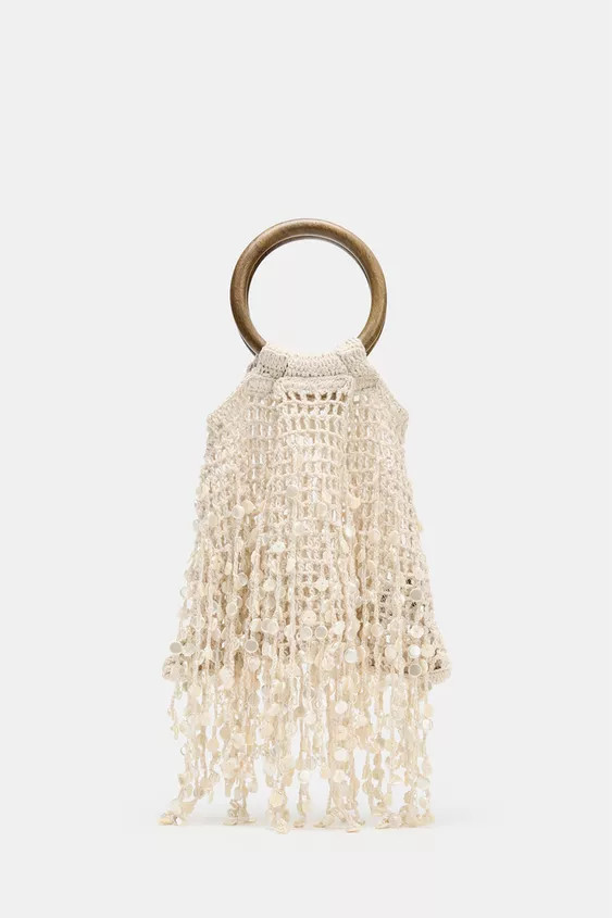 Woven bucket bag with beaded fringing on the top. Double rigid top handle.Height x Length x Width... | Zara UK