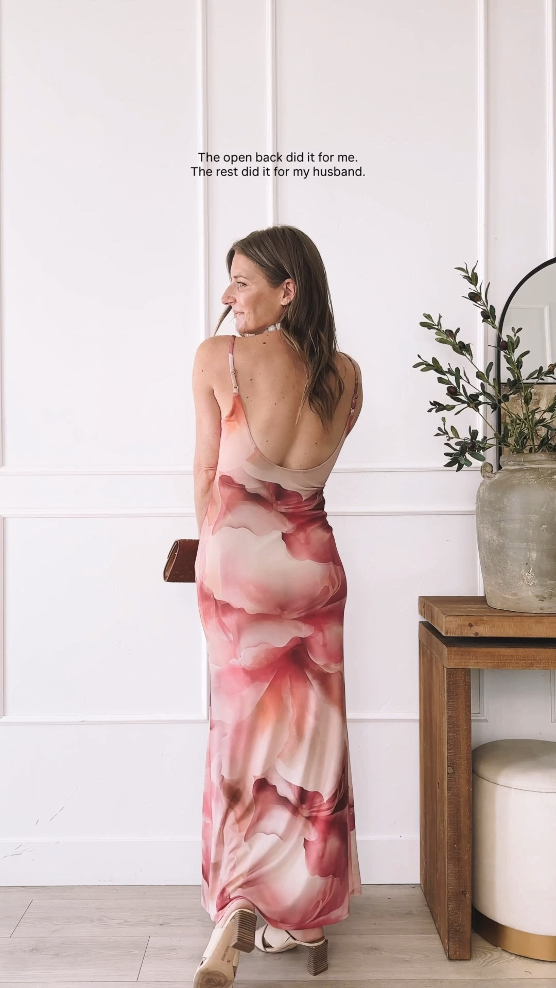 Pink watercolor open back maxi dress styled with pearl necklace woven clutch and block heel sandals. Wearing a small, I am 5’8” for length reference. Super stretchy double layer mesh, not sheer at all. Full details linked here. Click to shop the full look.
