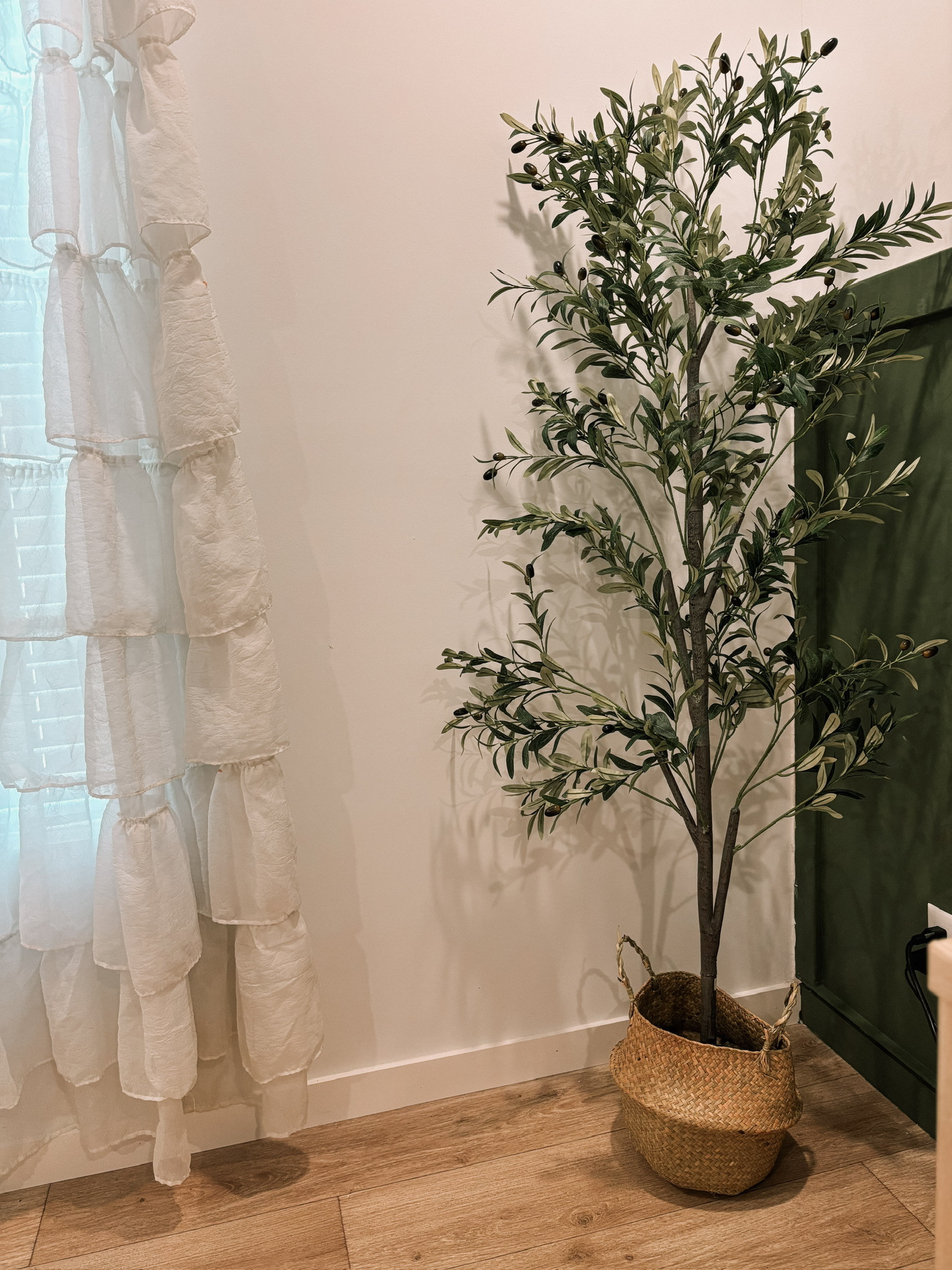 Got this olive tree from Walmart a while back, but linked some similar ones!  

 #LTKHome
