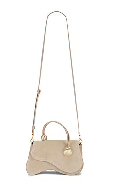Cult Gaia Kazia Crossbody in Sand Dollar from Revolve.com | Revolve Clothing (Global)
