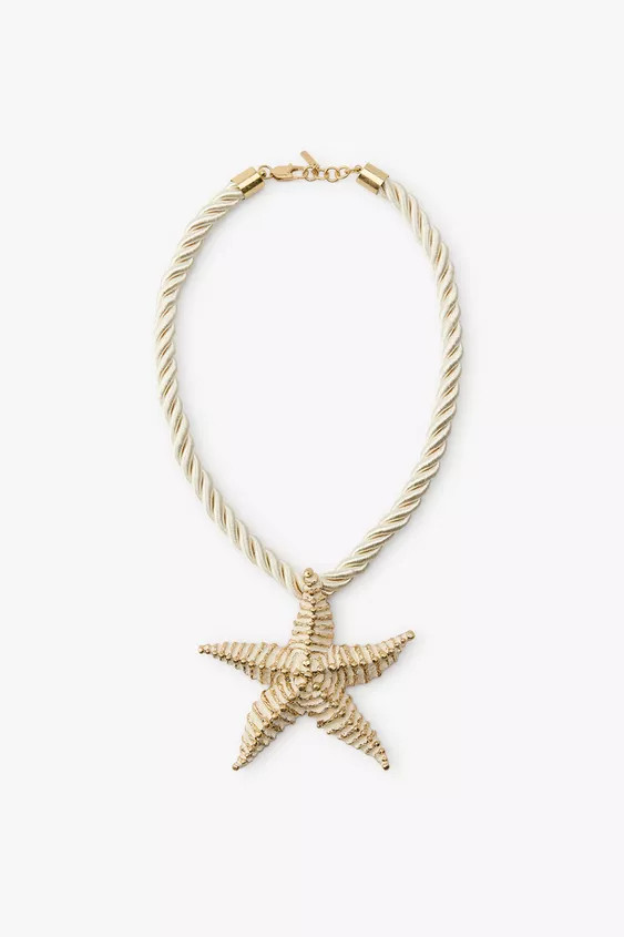 Cord necklace with a raised metal starfish pendant. Lobster clasp fastening. | Zara UK