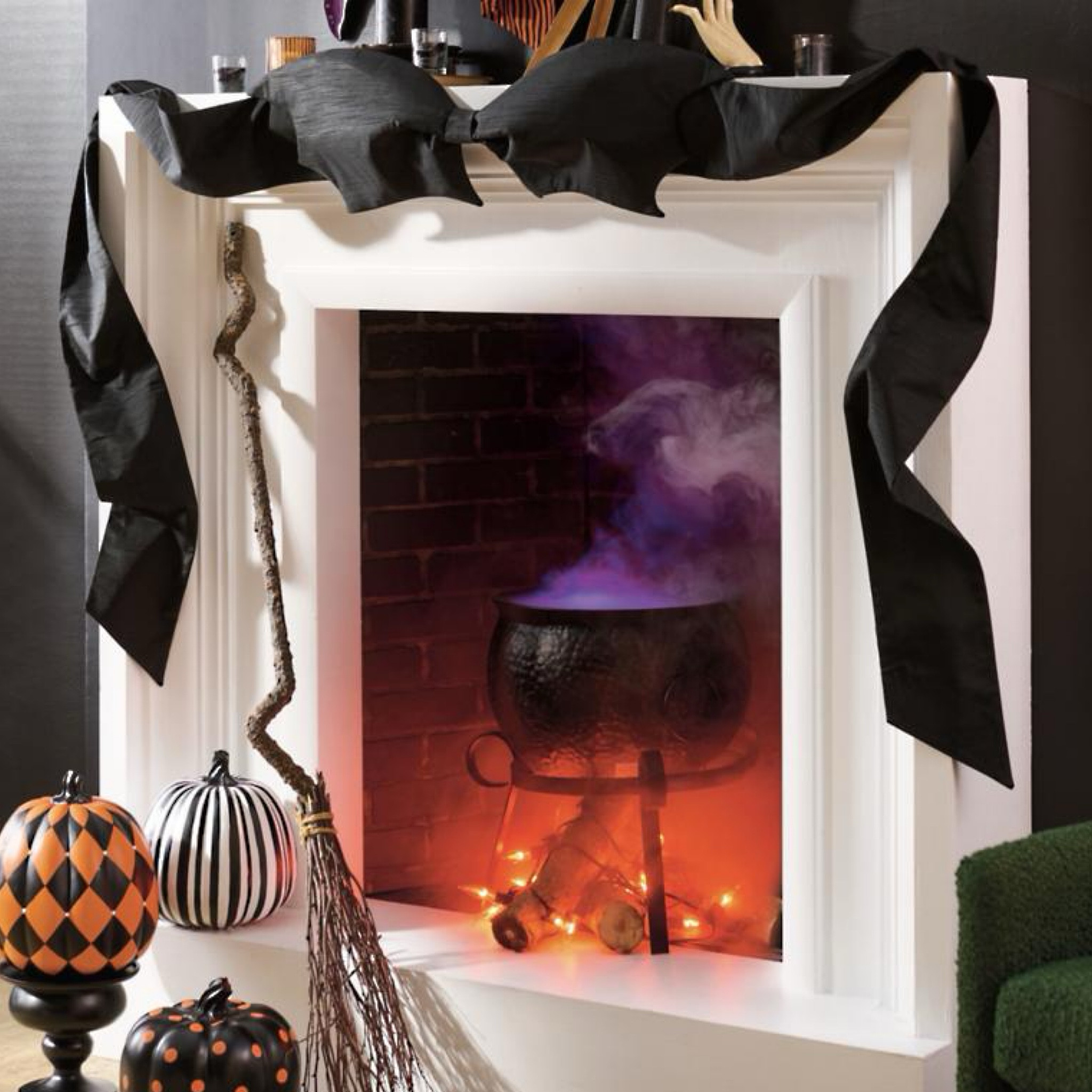 🎃Halloween Sale🎃
This gorgeous Halloween decorated fireplace and mantle features a beautiful midnight black Bat Bow Mantel Scarf with bat-wing scallop at the edges. 
Inside the fireplace is a metal cauldron on a stand and you can add your own personal touch of spooky lights, ornament bubbles, or enhance the thrill with a fog machine. 
The exterior of the fireplace is adorned with designer pumpkins and a festive witch’s broom ready for nighttime scares.

#LTKSaleAlert #LTKSeasonal #LTKHome
