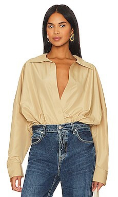 Norma Kamali Oversized Boyfriend Shirt Bodysuit in Sand from Revolve.com | Revolve Clothing (Global)
