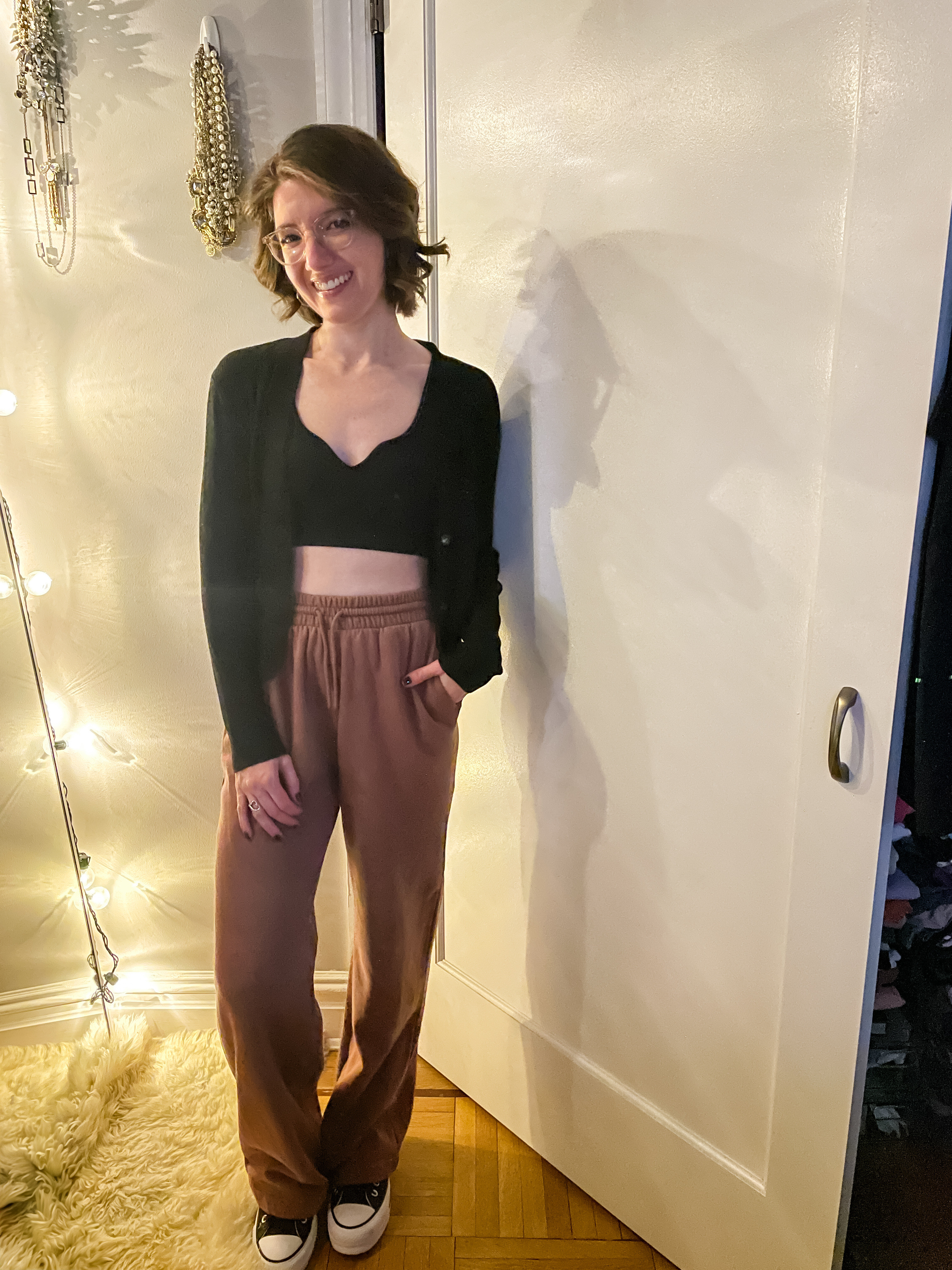 Cardigan: TTS
Cropped tank: TTS
High waisted wide leg sweatpants: TTS, don’t put them in the dryer
Sneakers: TTS

cozy outfit | loungewear | weekend outfit | New Year’s Day outfit 

#LTKFindsUnder50 #LTKFitness #LTKStyleTip