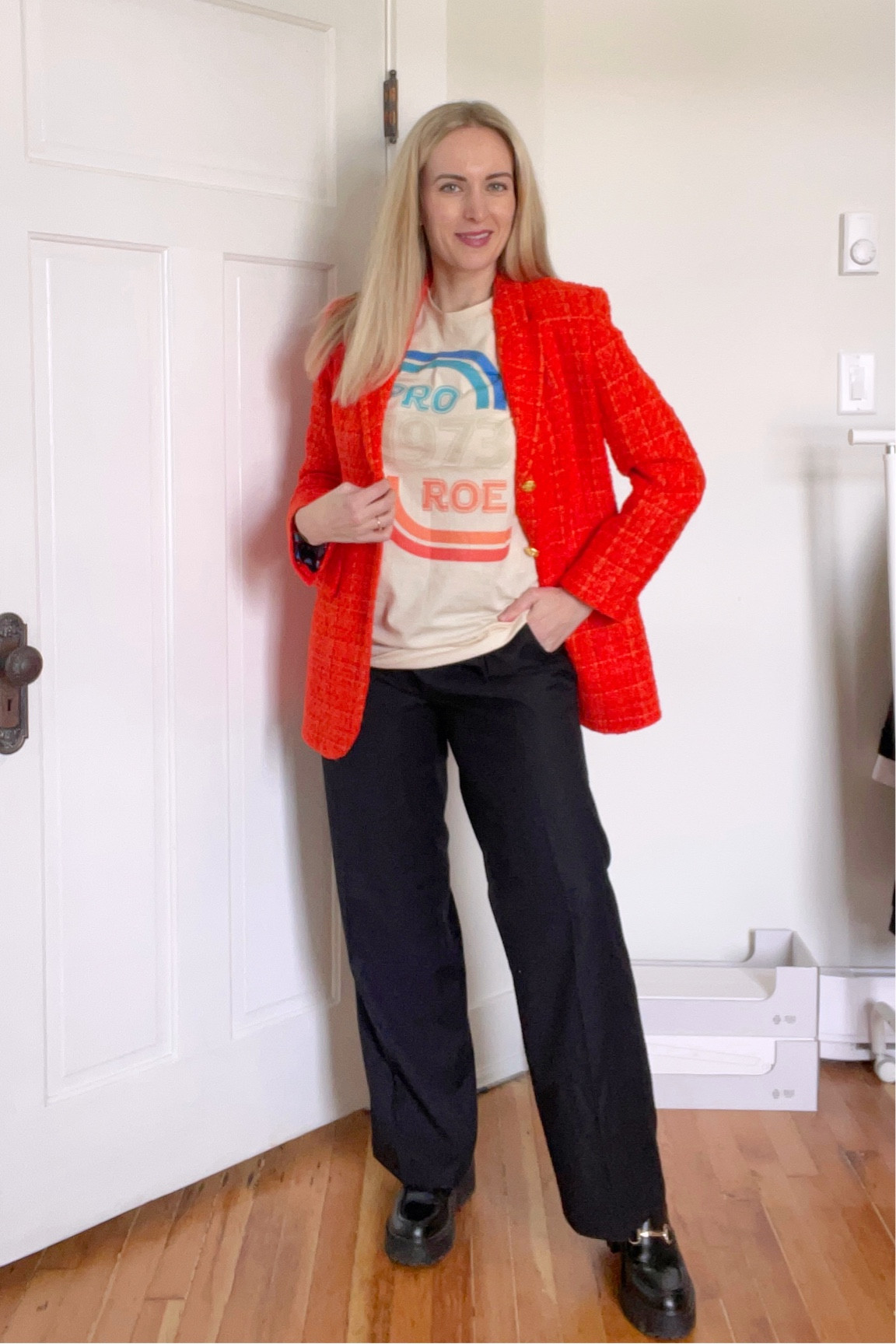 2023 graphic tee, orange blazer and black dress pants that are a dupe of the aritzia effortless pants for 1/2 the price! 

#LTKunder50 #LTKstyletip #LTKunder100