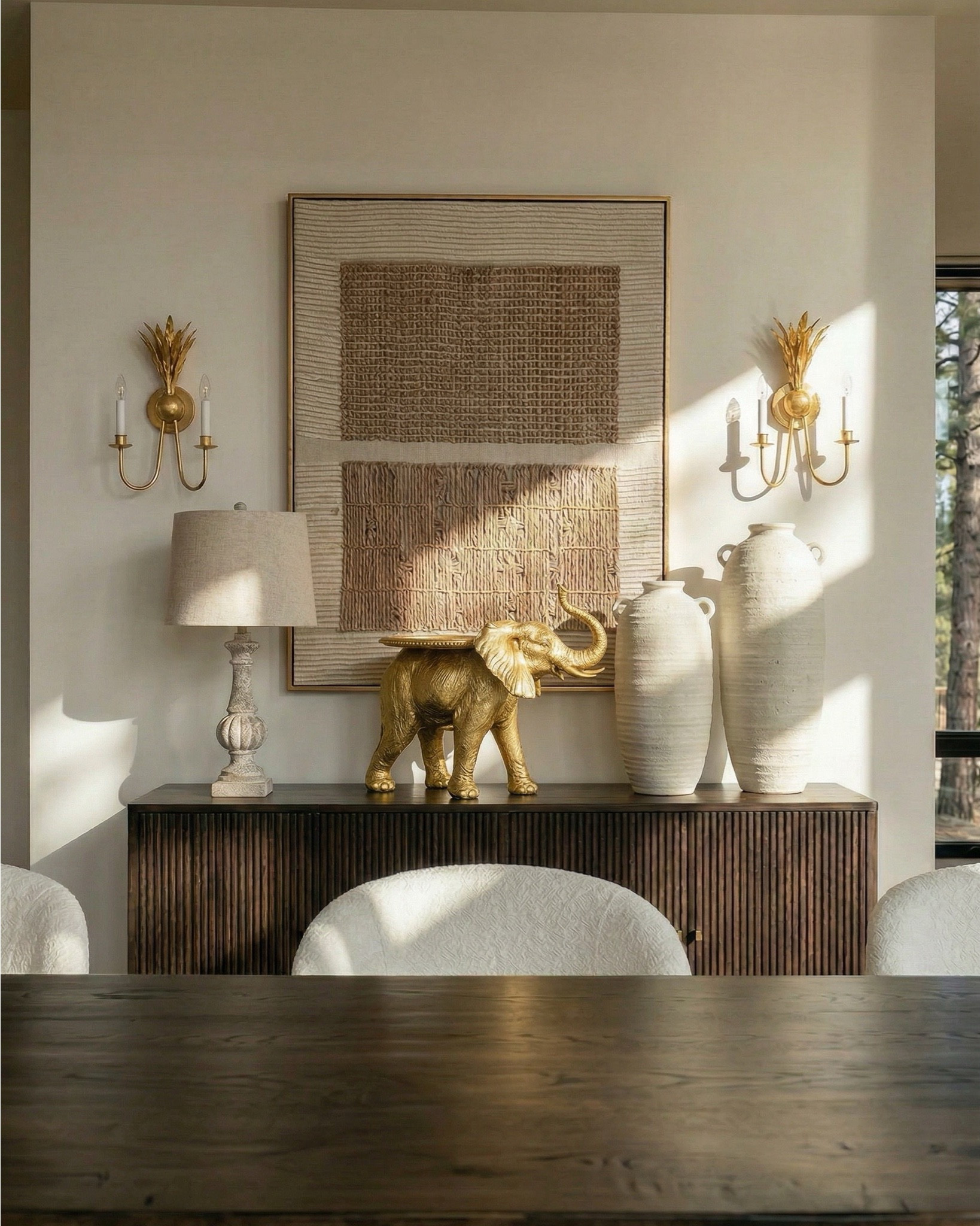 Furniture
* upholstered bed cream channel tufted
* boucle bench ivory curved legs
* dark wood nightstands traditional 3 drawer
* classic wood nightstand brass knobs
Lighting
* white globe pendant light oversized
* brass wall sconces double arm
* ceramic table lamp white shade
* marble base table lamp neutral
Decor
* gold framed wall mirrors tall rectangular
* gold floral wall art neutral canvas
* ceramic vase white sculptural
* decorative coral bowl white
* gold tray decor coffee table books
* neutral floral arrangement white stems
Bedding
* white duvet cover luxury hotel style
* brown chunky knit throw blanket
* neutral accent pillow terracotta pattern
* white euro pillows minimal
Textiles
* brown cream diamond pattern rug
* geometric area rug neutral tones
BEDROOM 2 (Dresser + Accent Corner)
Furniture
* curved wood dresser dark walnut
* modern vintage dresser brass pulls
* boucle accent chair cream
* upholstered armchair neutral fabric
Decor
* scalloped gold wall mirror statement
* decorative tray gold round
* ceramic decorative bowl textured
* stacked coffee table books neutral decor
* sculptural decor objects modern organic
Textiles
* neutral throw pillow abstract pattern
* boucle cushion cream texture

🍽️ DINING ROOM (Dark Wood + Organic Modern)
Furniture
* dark wood dining table trestle base
* rustic wood dining table large
* upholstered dining chairs cream curved
* boucle dining chairs rounded back
* ribbed wood sideboard cabinet
Lighting
* brass chandelier modern classic
* gold chandelier candle style
* brass wall sconces decorative
Decor
* large ceramic floor vase white
* tall decorative vase with branches
* black decorative bowl centerpiece
* gold elephant figurine decor
* neutral abstract wall art textured
* table lamp linen shade neutral
Textiles
* neutral area rug with black stripe border
* modern striped rug cream black


#LTKSaleAlert #LTKHome