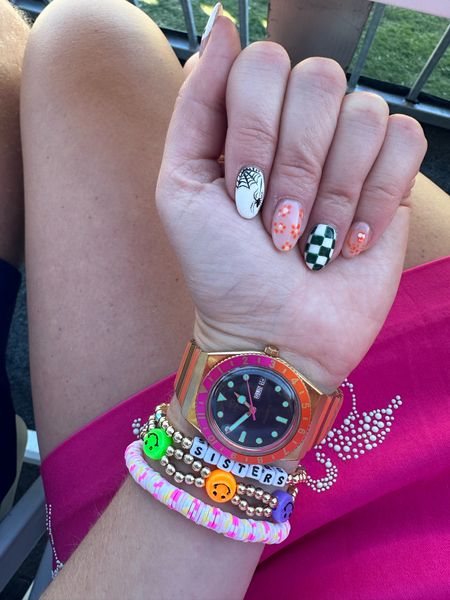 Arm candy. Halloween nails. Watches   rainbow colors  

#LTKstyletip #LTKGiftGuide