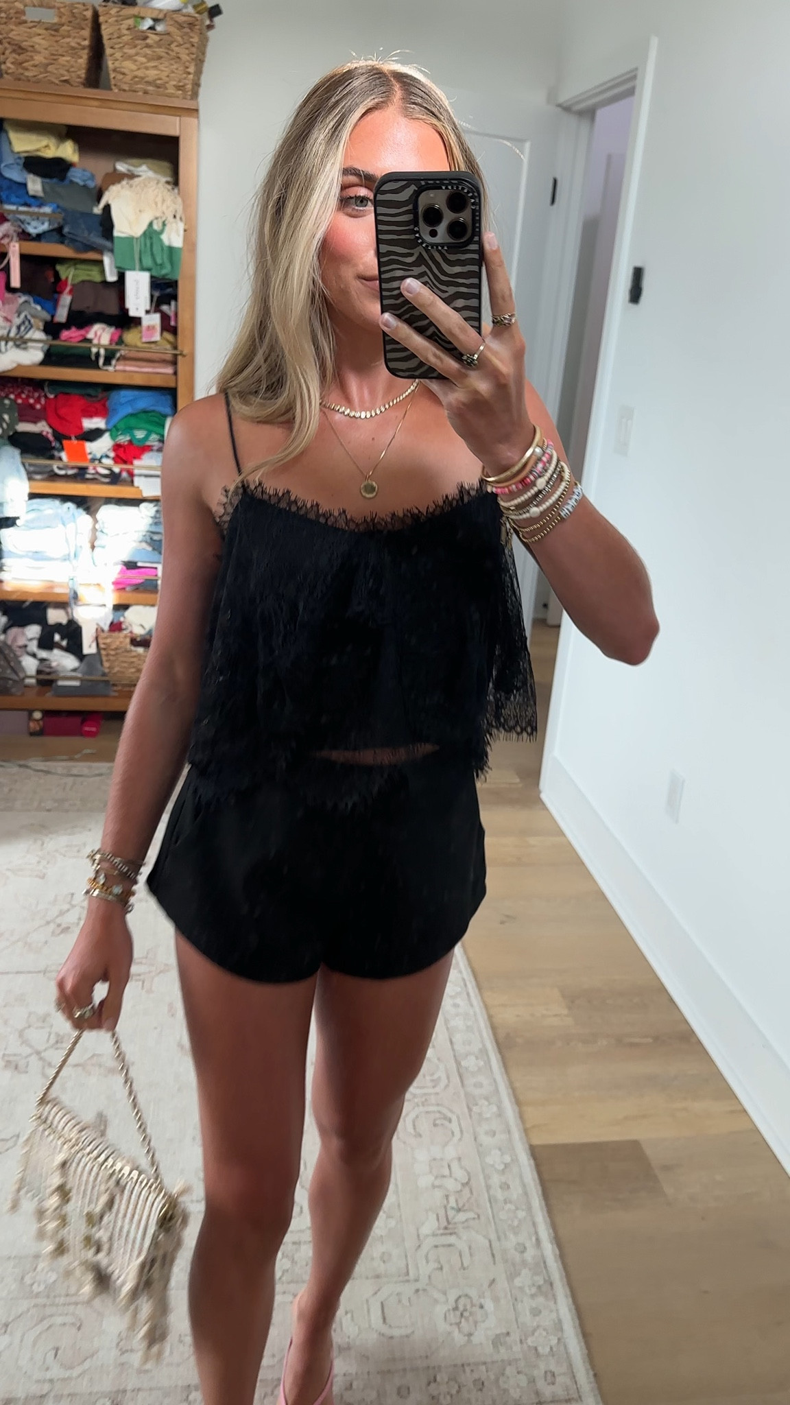 Friday night outfit! My top is from @objectrare my code is SLOANE15 it’s the brand Marsy size xs Lace Cami with Ruffle, a top that exudes feminine charm and fashion-forward style. Crafted from delicate lace fabric, this top features a flattering ruffle neckline and adjustable spaghetti straps for a comfortable fit. My shorts are my favorite micro shorts @Revolve  size XXS. My bag is from Kooreloo. My shoes are Amazon

#LTKootd #LTKSaleAlert #LTKdayinmylife