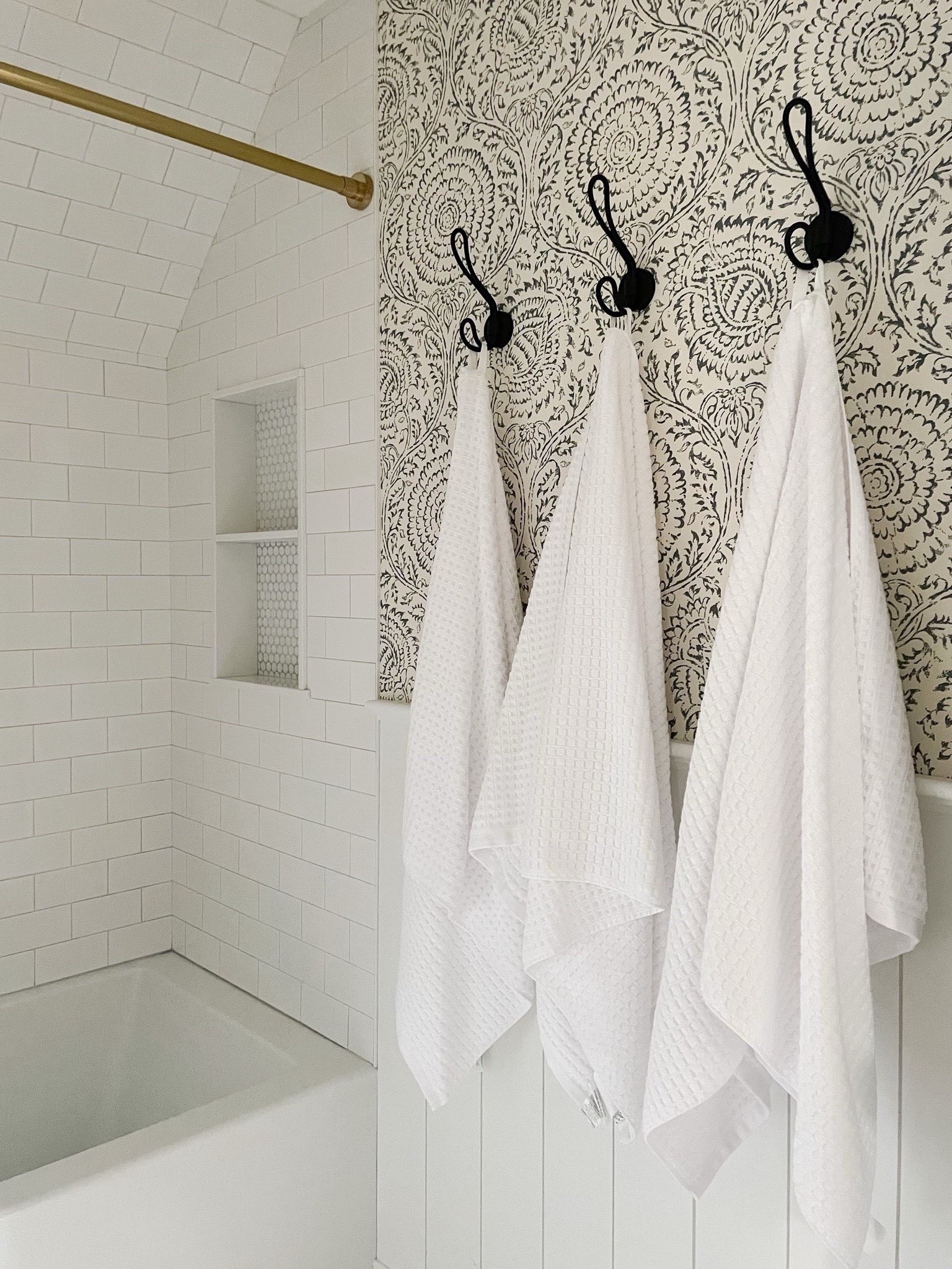 A spa-like nook in the kids’ bathroom 🧖🏼‍♀️ I love the simplicity of plain white bath towels. They feel and look extra luxurious, but that doesn’t mean they have to come with a high price tag! I’ve found several terry waffle knit towels that would make a nice little upgrade to your bathroom. Several of these are on sale! I’m also linking our towel hooks and a similar wallpaper. 

#LTKSaleAlert #LTKHome
