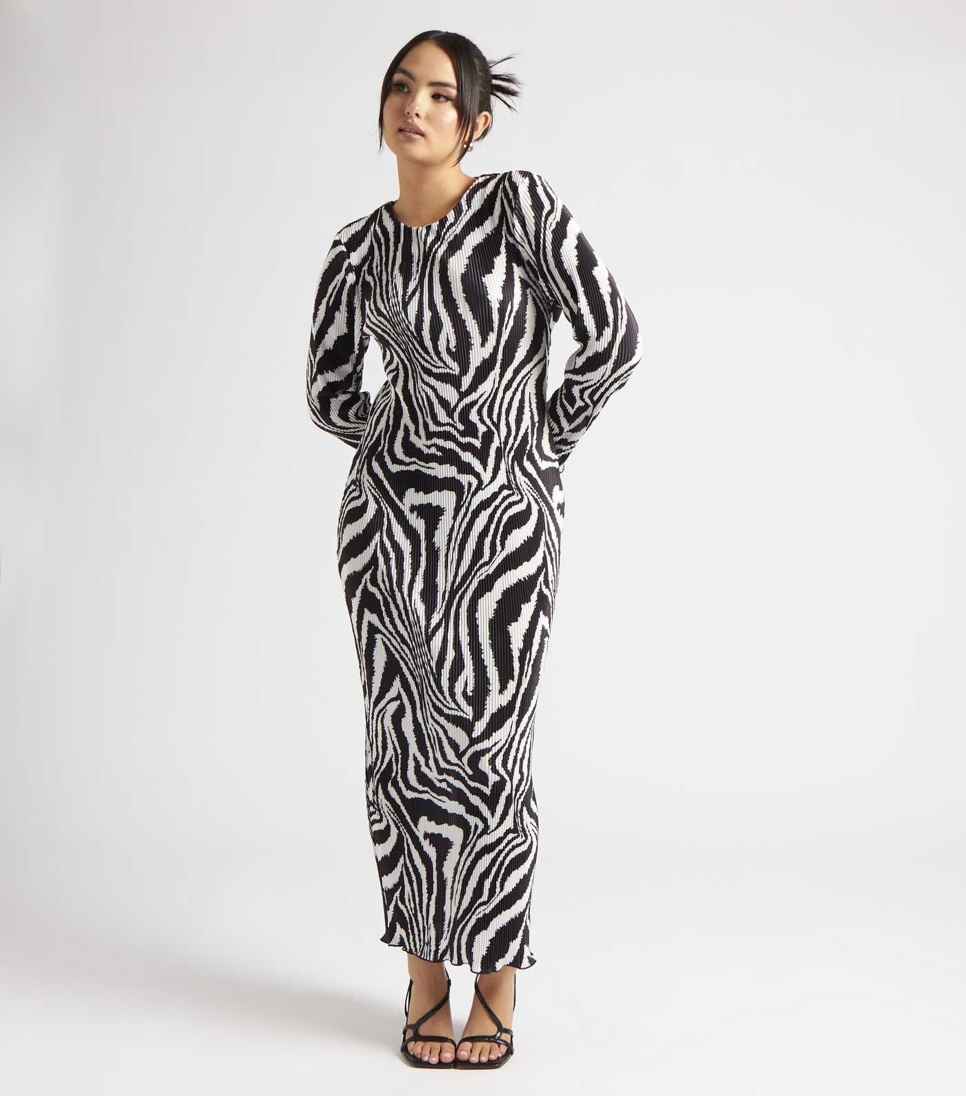 Urban Bliss Black Zebra Print Plissé Maxi Dress
						
						Add to Saved Items
						Remove fro... | New Look (UK)