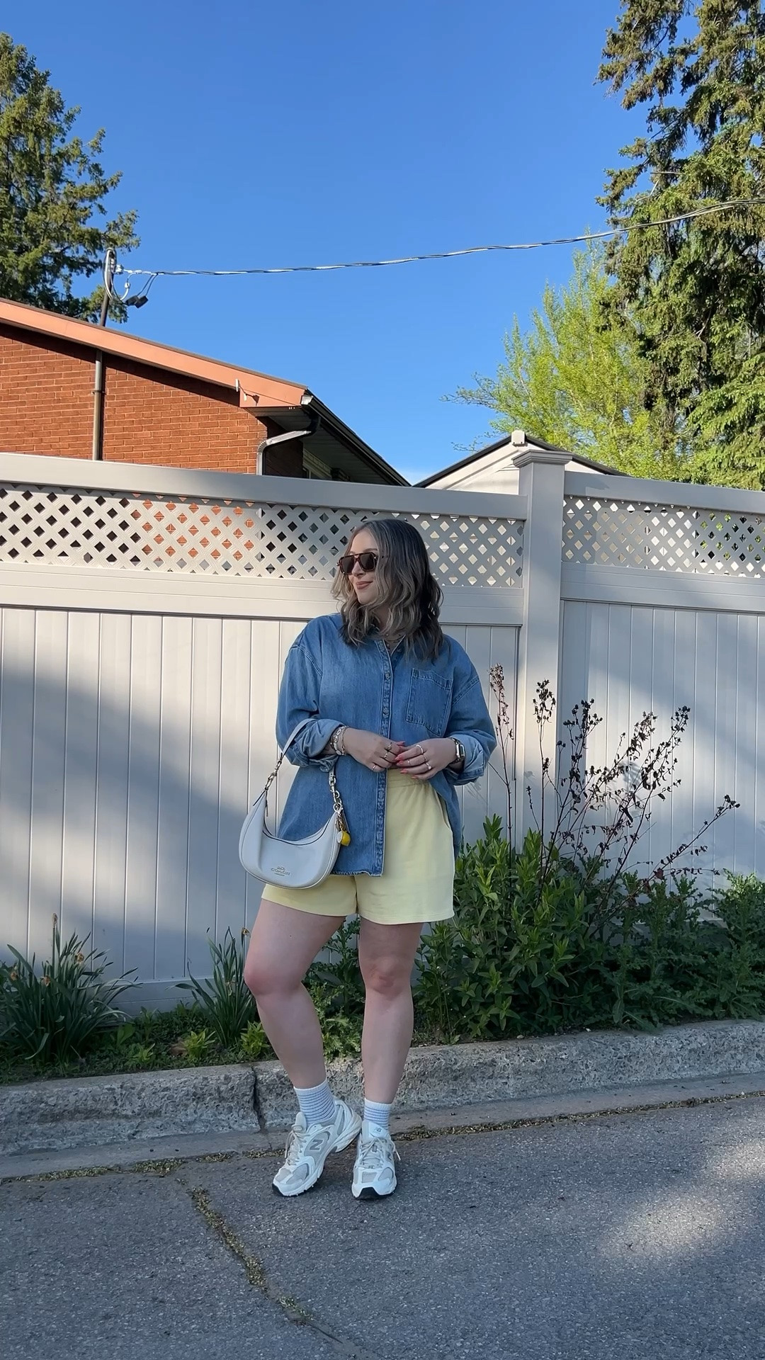 Comfy casual spring to summer outfit! Wearing my usual size L in both the denim shirt and butter yellow shorts. Canadian Old Navy links are under “similar products”. New Balance sneakers are so comfy for walking but run a little big, I’m a 9.5-10 and wear a 9.

#LTKsummer #LTKmidsize #LTKsale