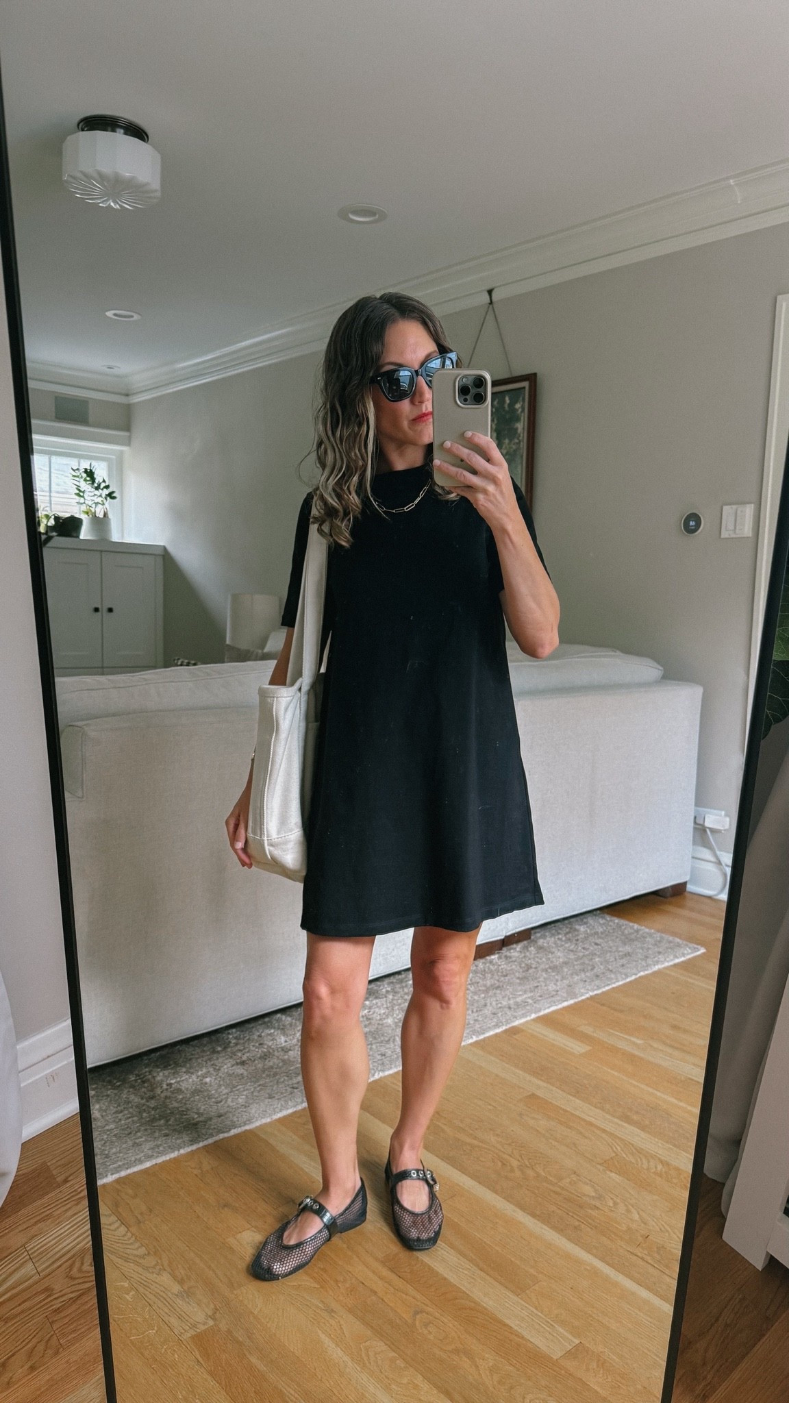 What I Wore: Black T-Shirt Dtess + Mesh Ballet Flats 

Sèzane dress, XS, TTS. Steve Madden flats, exact pair is sold out, linked similar. Quince sunglasses. Lands End bag, medium, long handles.

#LTKootd #LTKOver40 #LTKPetite