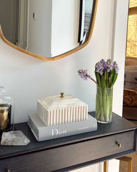-gold framed mirror
-fluted stone box with gold detail 
-clear minimal vase
-Dior book
-candle with hurricane 


#LTKhome