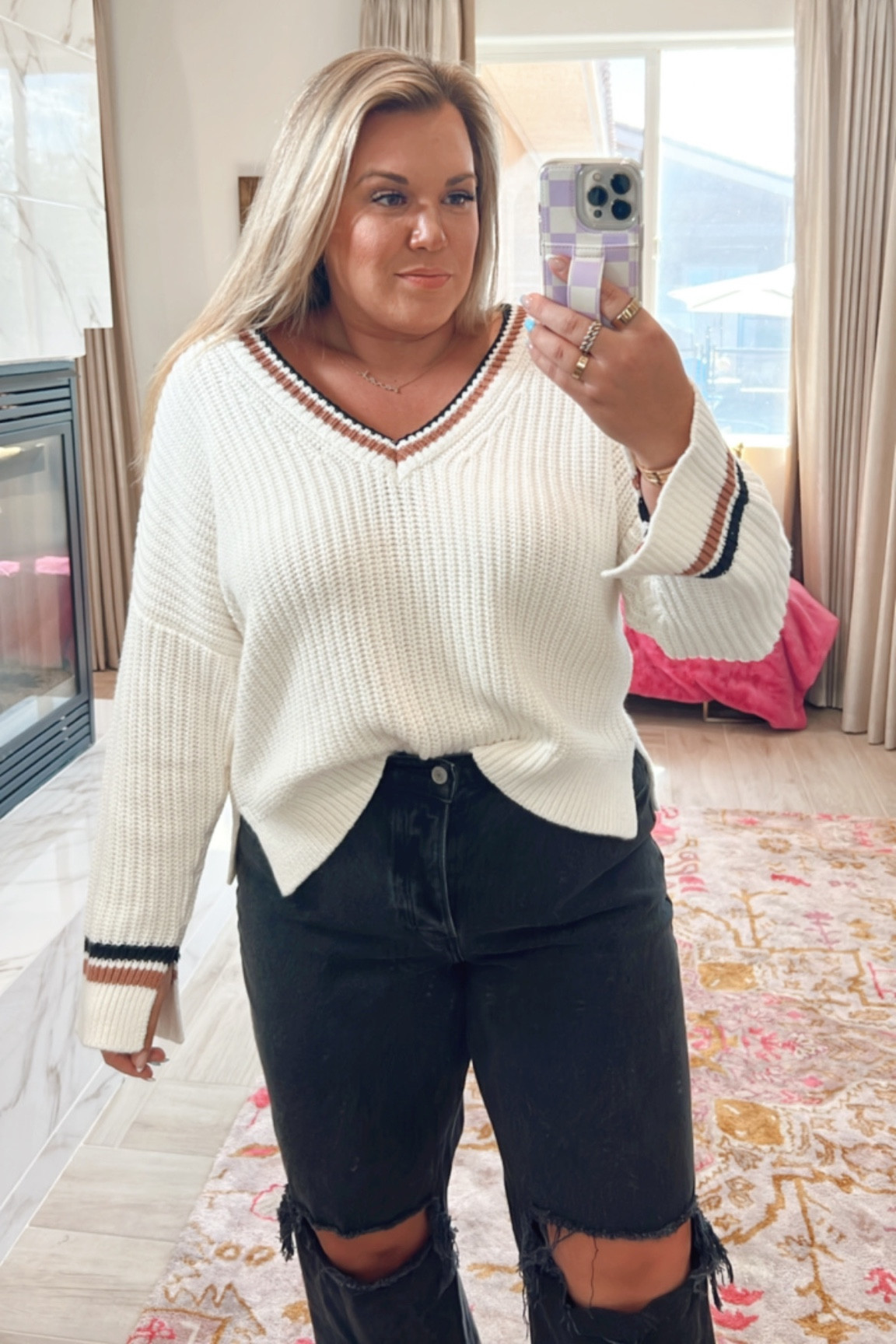 curvy fall sweater outfit! wearing size xl in varsity sweater and size 32 in black distressed denim 

#LTKcurves #LTKunder100 #LTKSeasonal