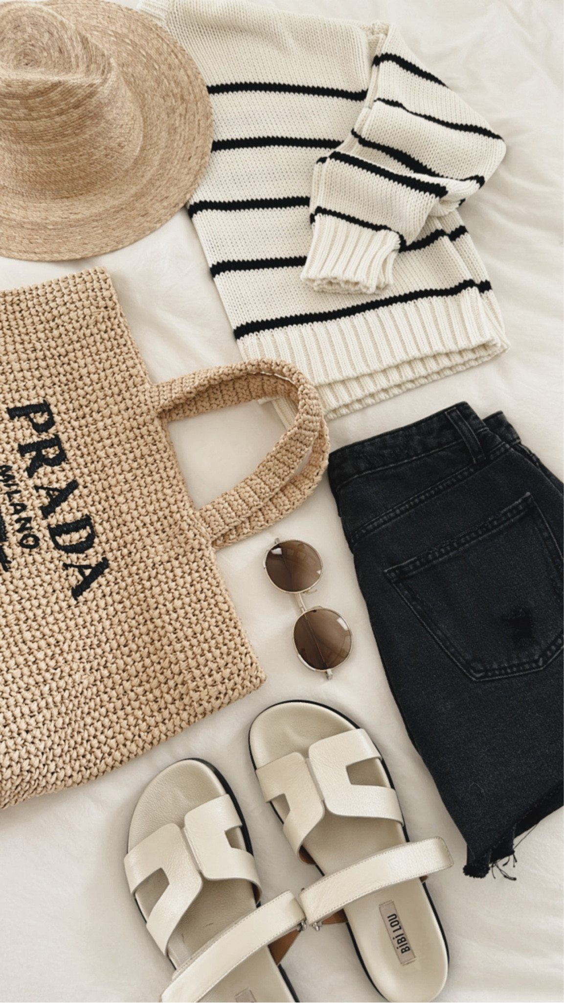 Black and white outfit, striped sweater, warm weather style #StylinbyAylin 

#LTKstyletip #LTKSeasonal #LTKfindsunder100