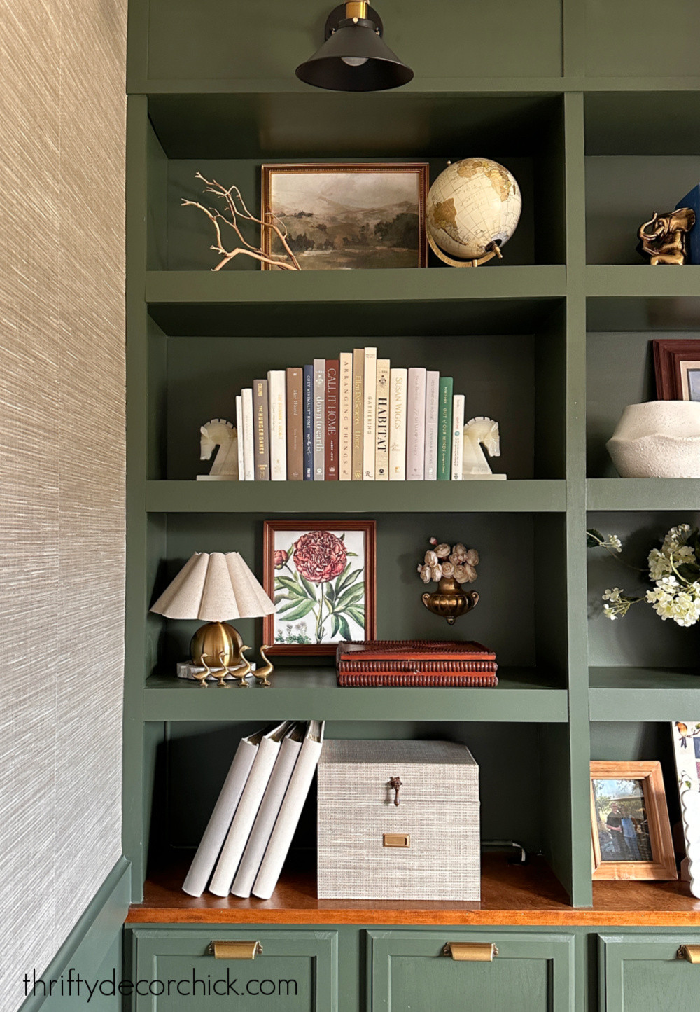 My office makeover is coming along! Love the grasscloth with the dark green bookcases.  

 #LTKHome