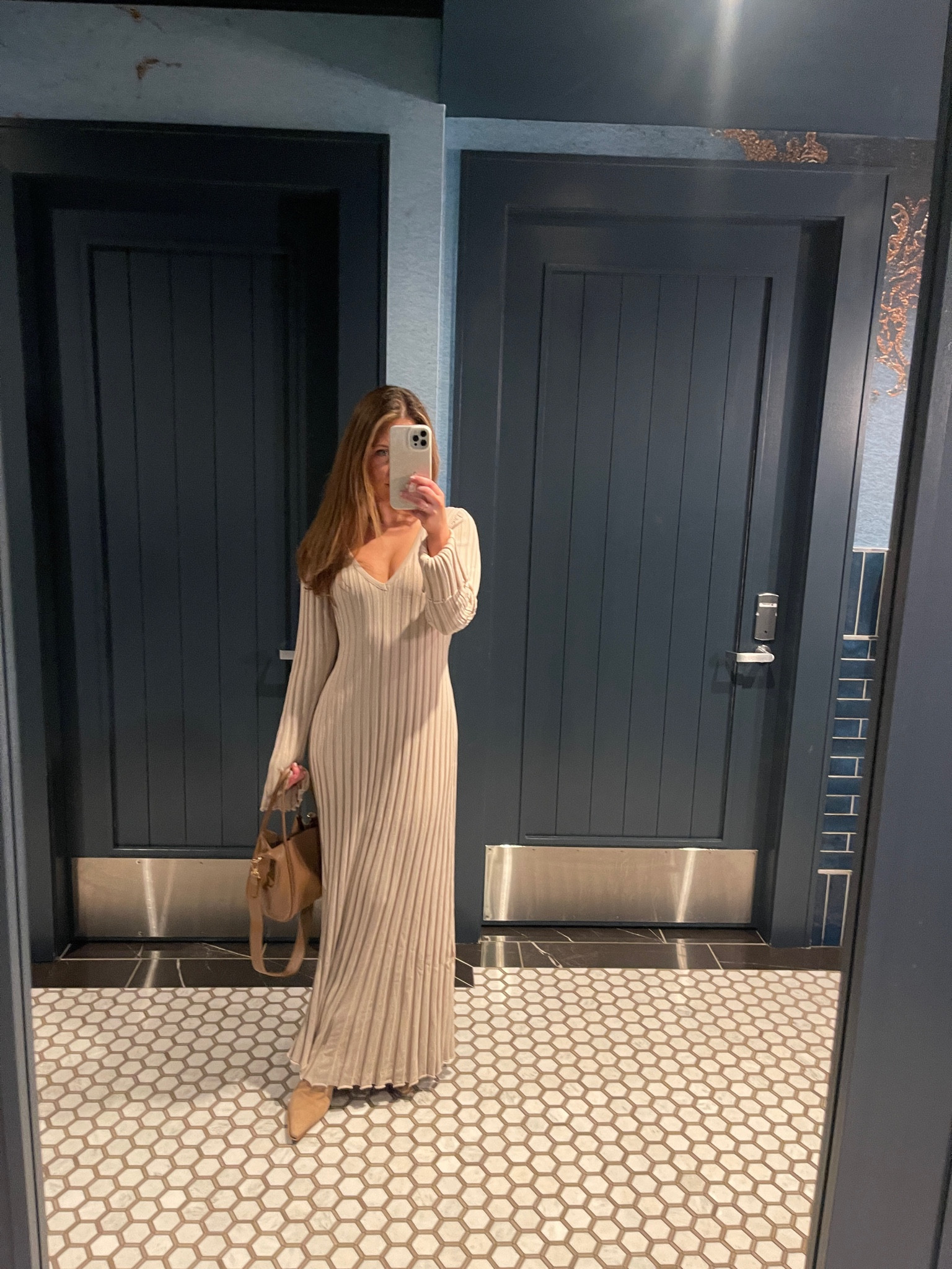 Holiday, christmas, or winter dress. Heavy material & hangs on the body. No alterations needed, I’m 5’3. Wearing heeled boots with this 

Cutest brown leather hand bag from it reminds me of Polene.  