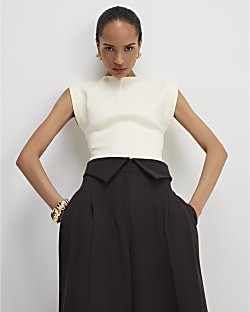 Cream Fitted Knit Sleeveless Top | River Island UK & IE
