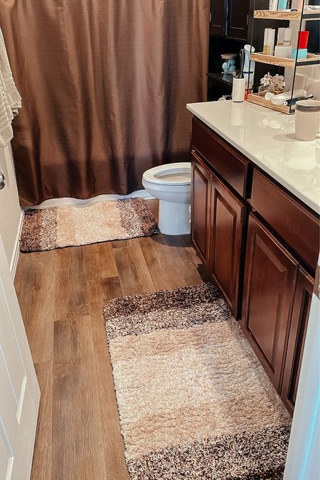 Primary bath rugs // bath mats // bathroom rugs // shower curtain

Rug in front of bathtub: 24x36
Rug in front of sink & cabinets:24x47

#LTKhome #LTKsalealert #LTKunder50