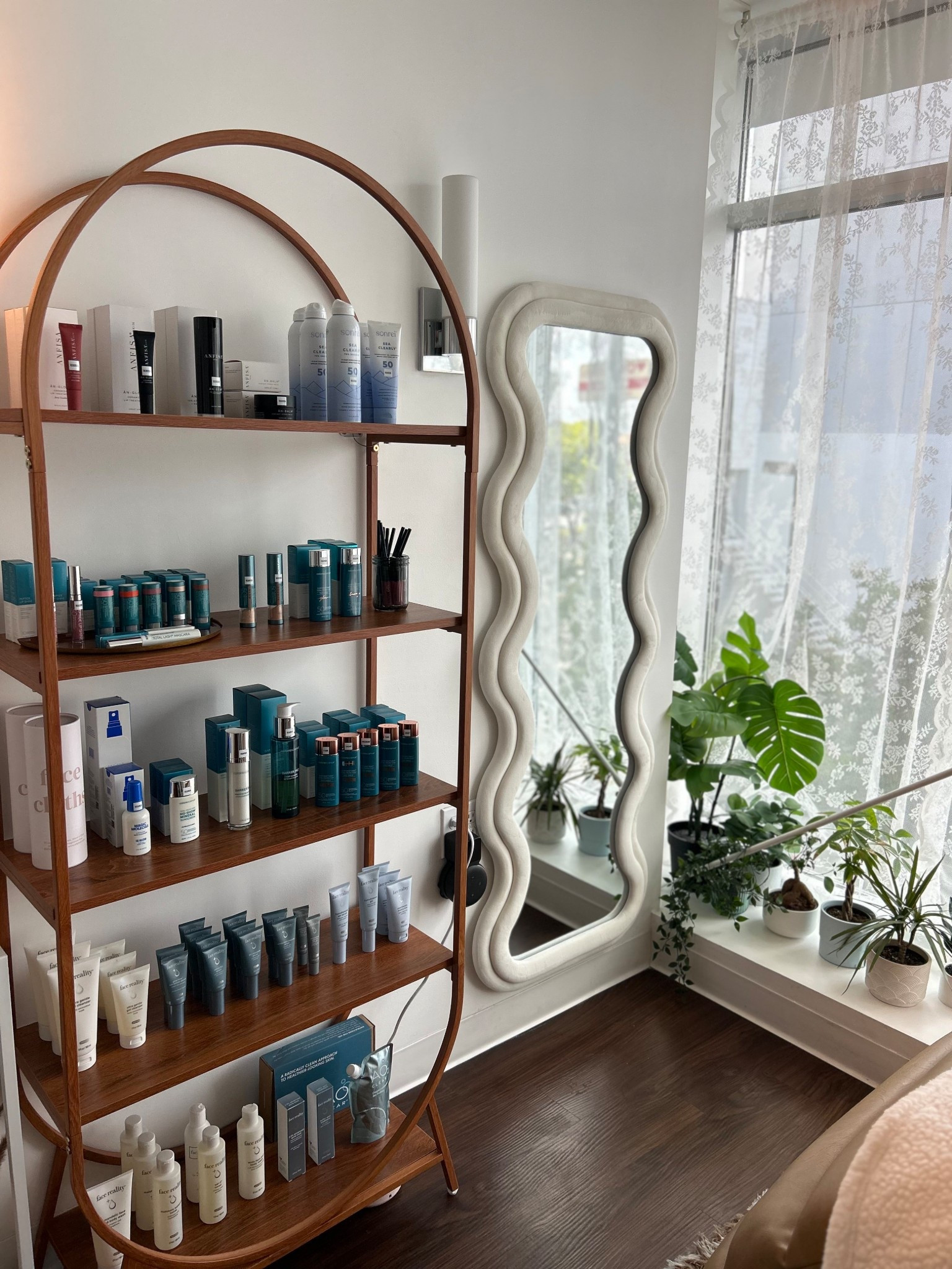 My little retail corner at my spa ✨ A mix of cozy, functional, and calming details that make the space feel extra inviting ☁️

I’m especially in love with this cream velvet wavy body mirror and arched freestanding bookshelf. Perfect for retail display, an esthetician room, or a salon suite. Also gorgeous pieces for home or office!

Shop below ↓ 🤍 I’d love to see how you style these in your own space!

#LTKHome #LTKBeauty