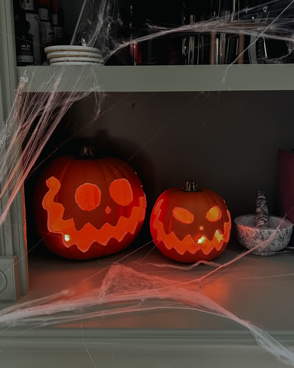 It's spooky season! I saw these pumpkins on tiktok and had try them out! These are carve-able craft pumpkins that I made to look kinda like a whimsical spooky. In Harry Potter there is a scene with floating jackolanterns and that was the Halloween vibe I was going for with these! They can be hung from the ceiling or used to decorate your shelves. These Halloween jackolantern pumpkins are perfect for your spooky decor!#LTKHalloween

#LTKhome #LTKSeasonal