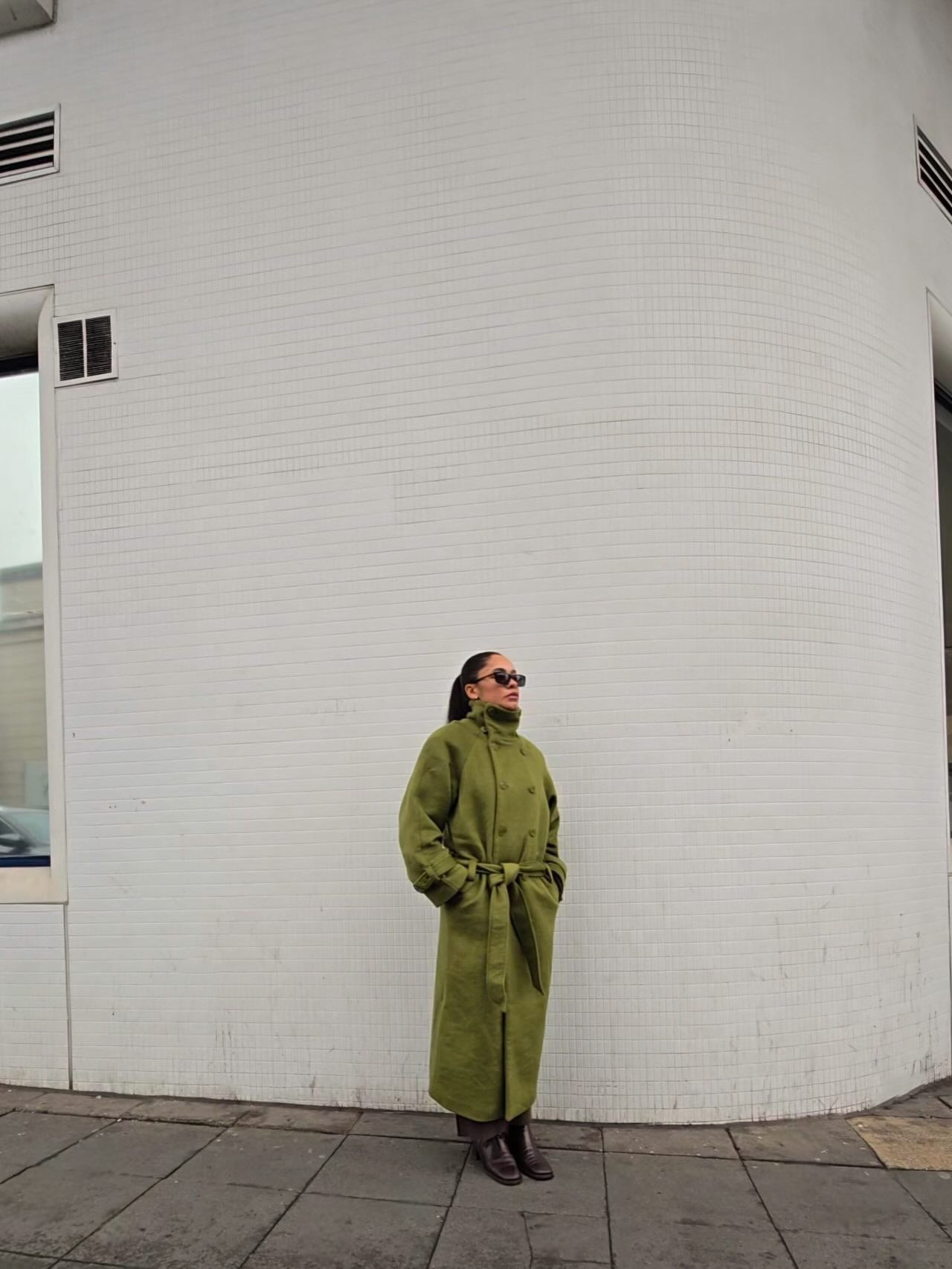 ad Wrapping up in the most stunning green coat - could it get any more gorgeous? Just wait until you see the removable cape! Save 10% on everything (including sale) at @nakdfashion with code “astyleedit”