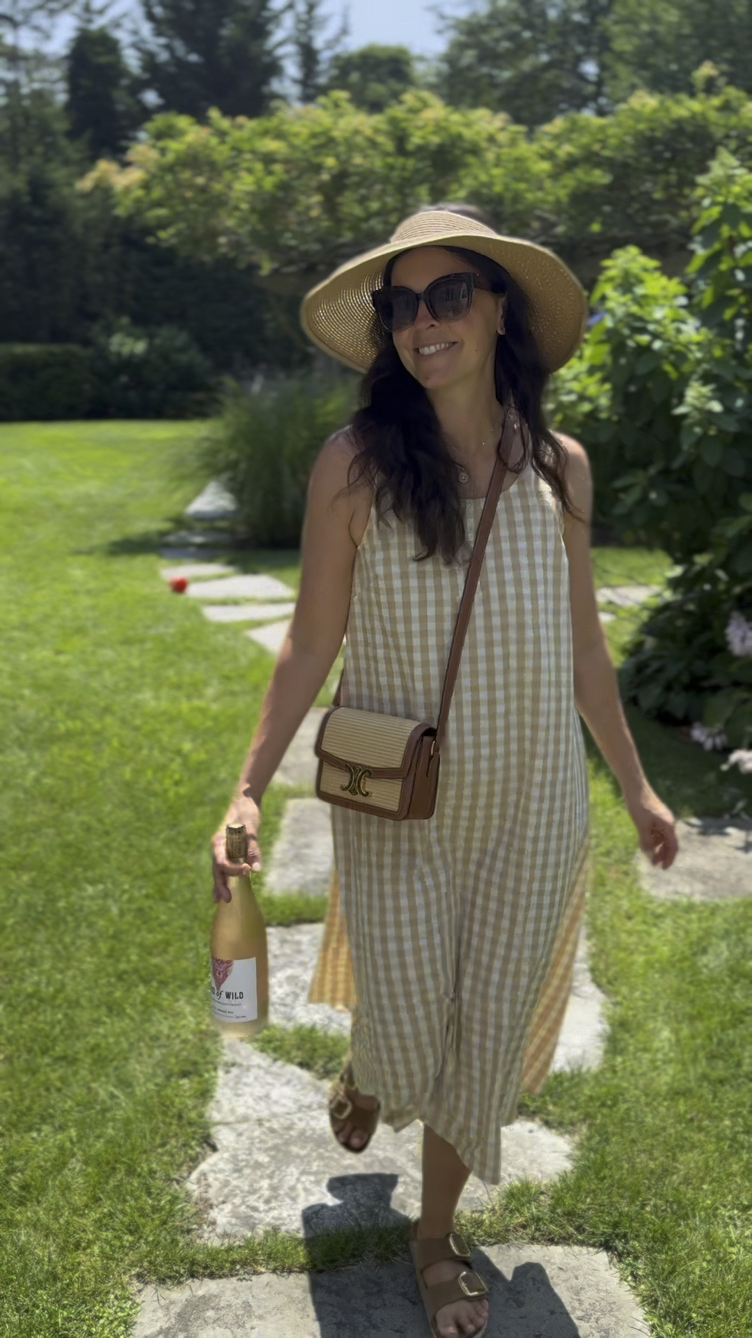 Off to lunch at our friends’ home. Love this comfy dress and I have been wearing this big visor all summer!! Of course, I have a bottle of Kind of Wild for a host gift 💝 

#LTKFindsUnder50 #LTKOver40 #LTKSaleAlert