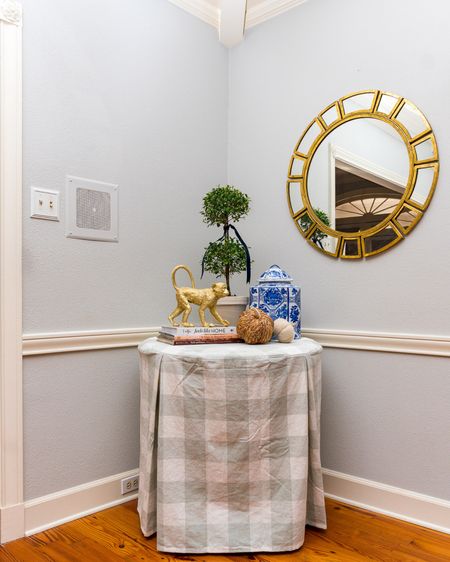 Classy corner table decor, round tablecloth, round mirror 

#LTKhome