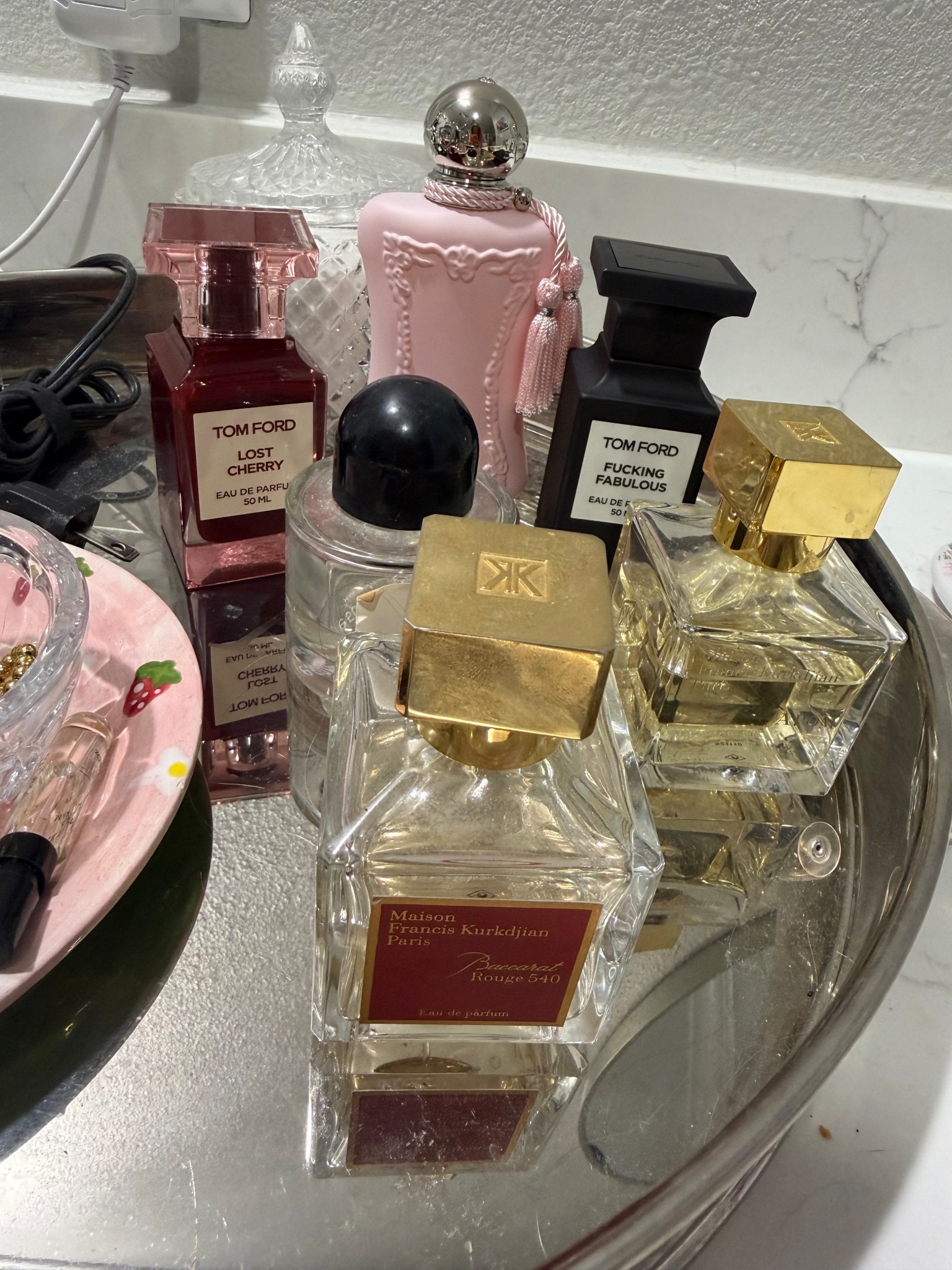Real life: my favorite fragrances! #perfume #beauty #maisonfranceskurkdjian #byredo #tomford #delina

#LTKselfcare #LTKBeauty