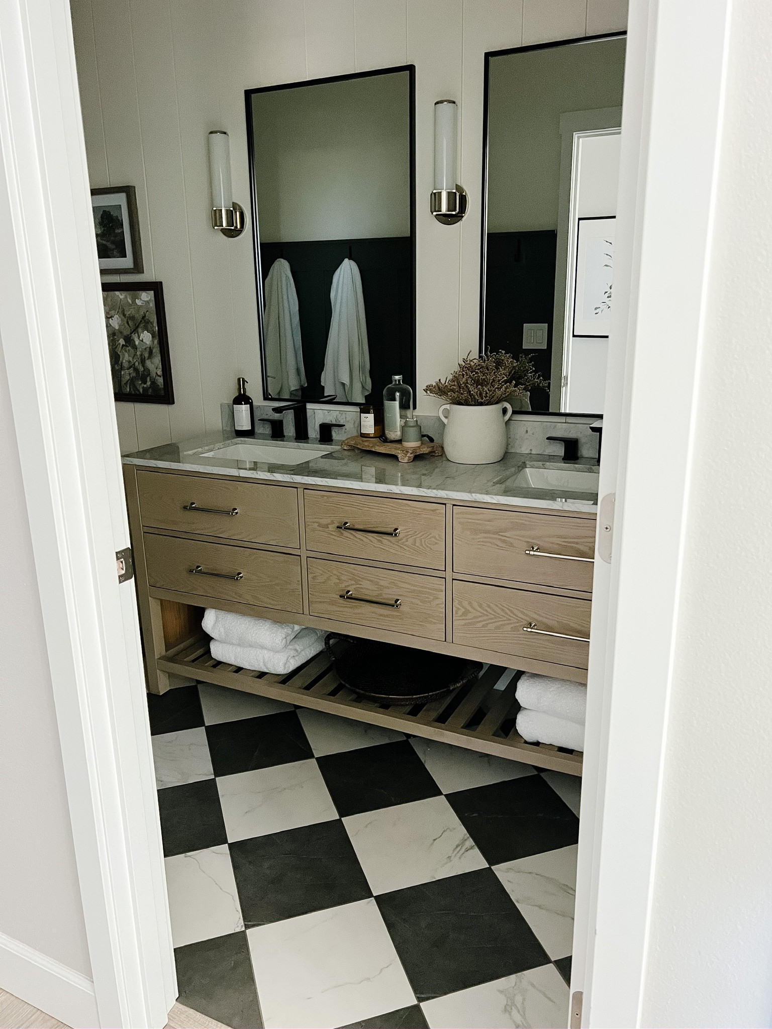 Our guest bathroom doesn’t often get a lot of love, but it’s easily one of my favorites! I just love the elegant black and white moment of our flooring, and I love this vanity! Linked what I could! 

#LTKhome #LTKstyletip