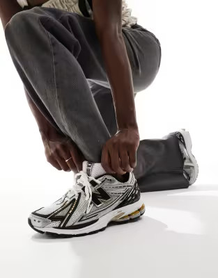 New Balance 1906 sneakers in gold and black | ASOS (Global)