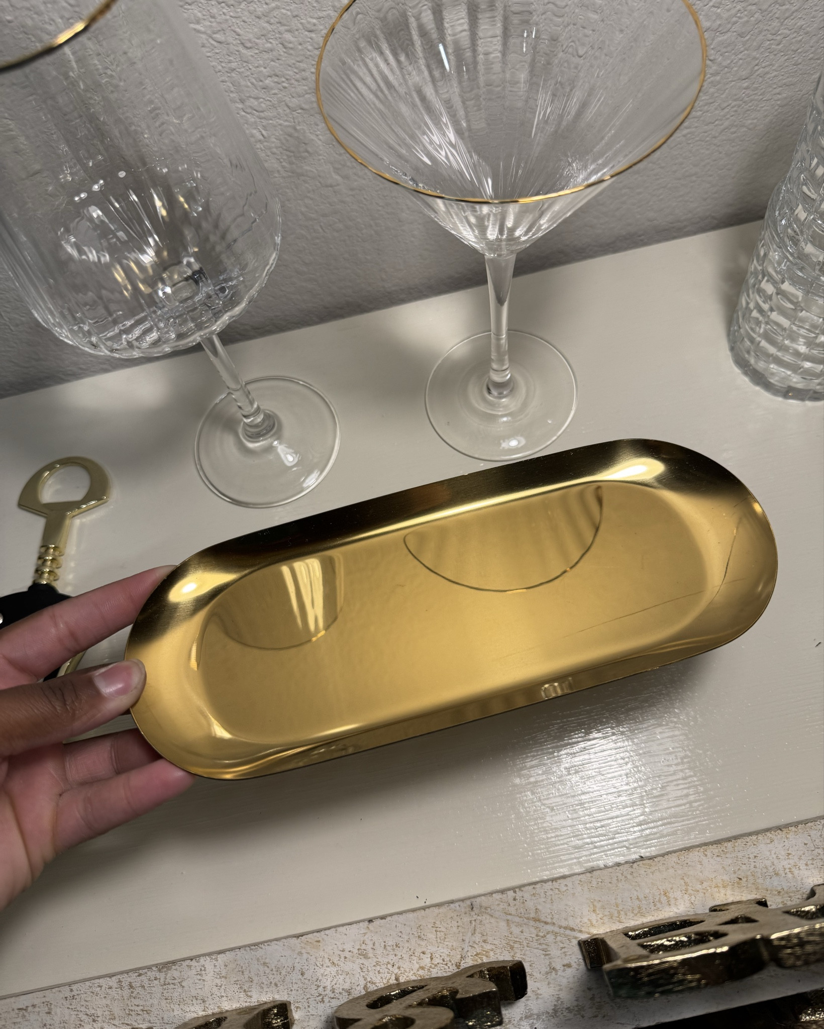 Slim gold trinket tray. Simple, lightweight, and does exactly what it needs to do without overpowering the space. I use mine to corral my shaker and glasses, but it works for keys, jewelry, or any little bar moment. A small detail that pulls everything together. ✨

#LTKHome #LTKFindsUnder50