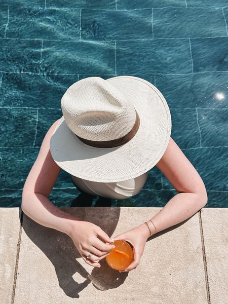 Packable hat from Janessa Leone
Summersalt swimsuit 
Poolside 
Summer look

#LTKSeasonal