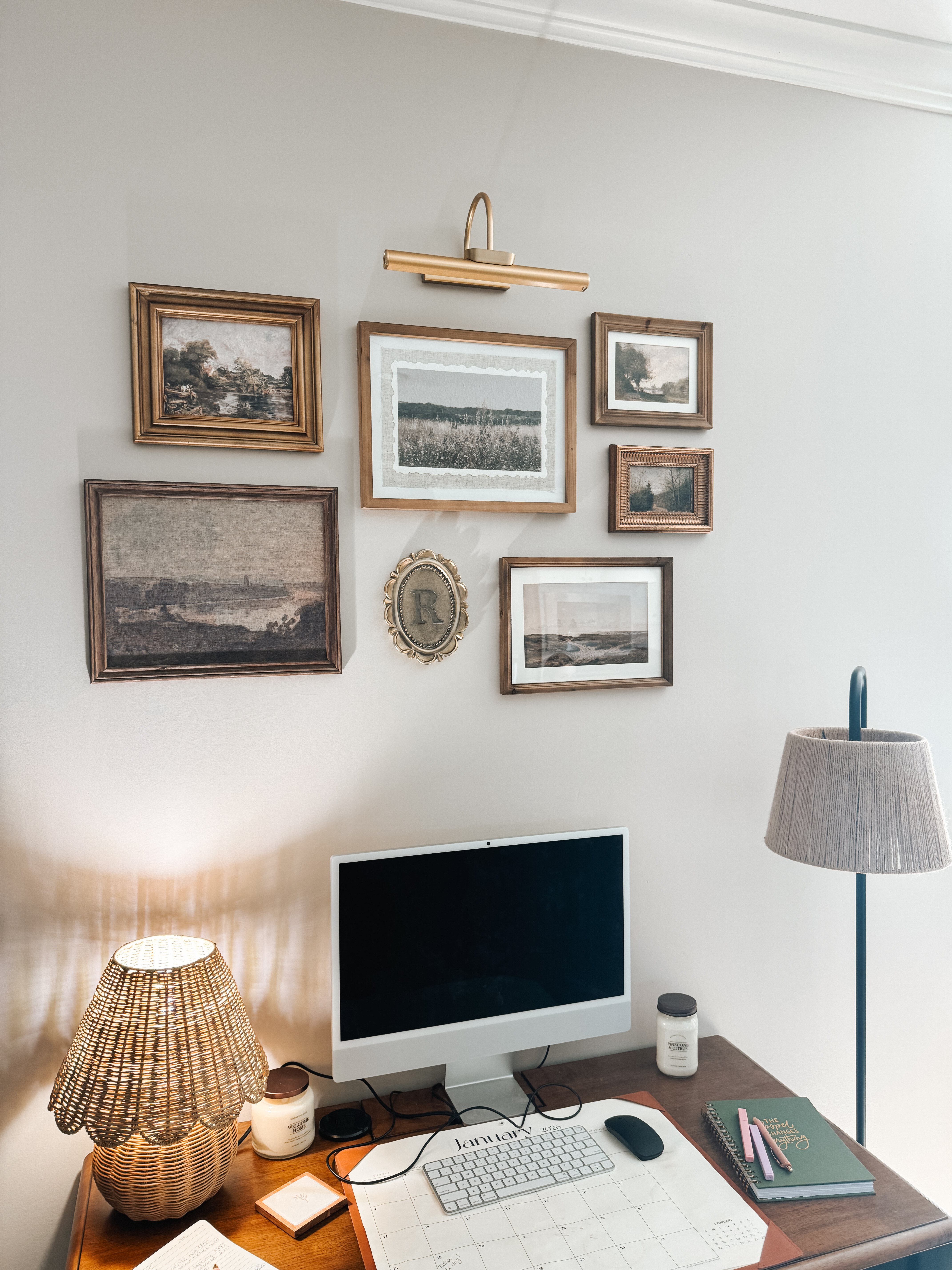 Home office gallery wall refresh – artwork is from Magnolia Home, woven table lamp is Target, and floor lamp is Walmart. Mixing affordable lighting with timeless framed art for a cozy, collected workspace look. 

 #LTKHome #LTKSaleAlert