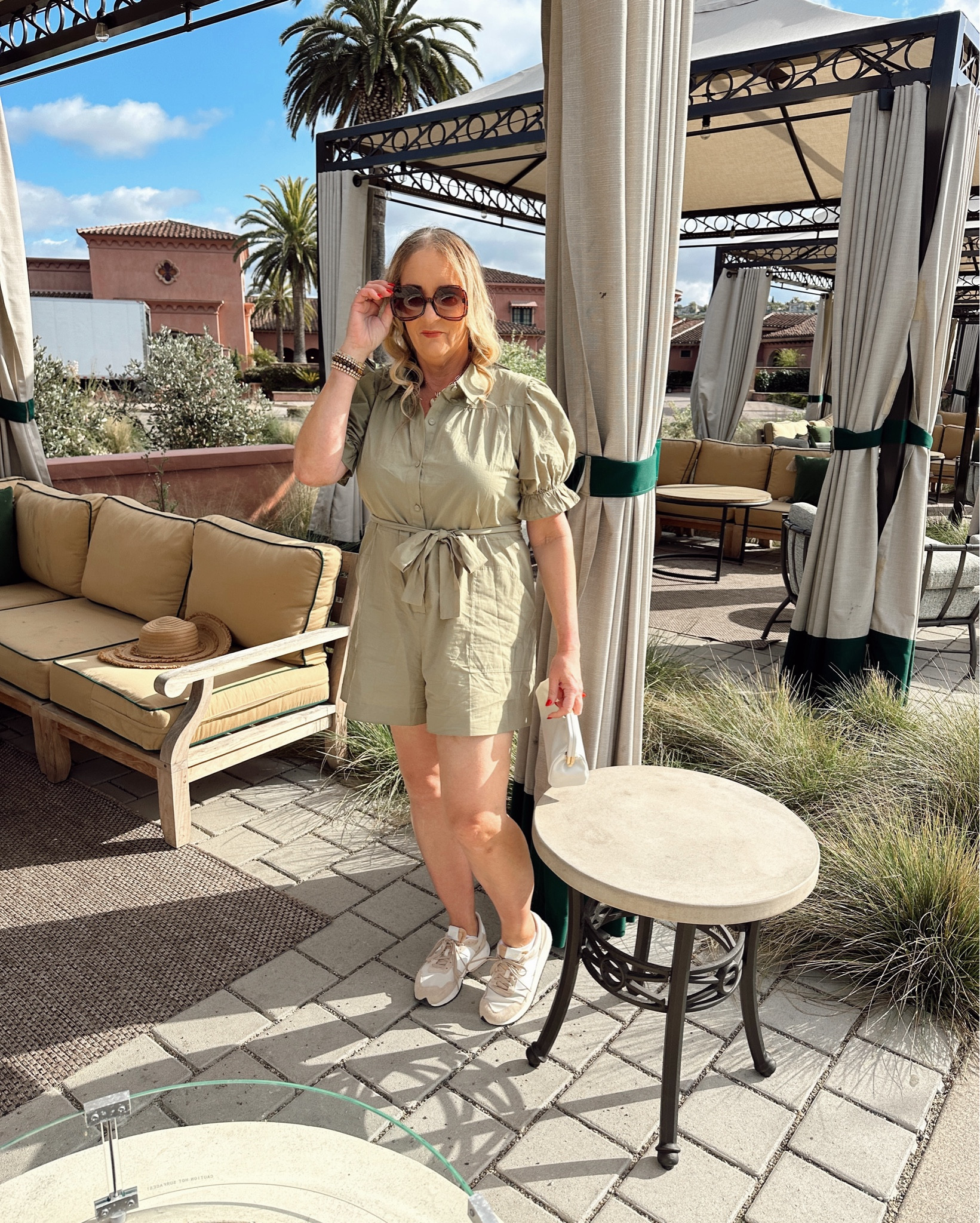 Effortlessly  chic in this khaki green Petal & Pup romper (wearing XL)! Perfect for spring & summer, styled with comfy New Balance sneakers & sunnies. Shop the look at Nordstrom! ☀️👗

#LTKFindsUnder100 #LTKSeasonal #LTKOver40