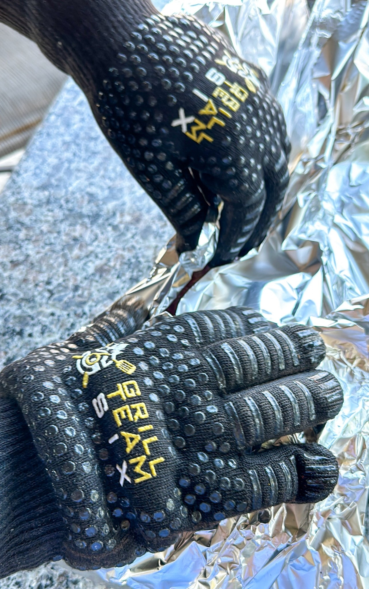 Football season means grilling and smoking on the Traeger grill. These grilling gloves make handling meat so easy. #GrillTeamSixGloves #GrillGloves #Gloves 