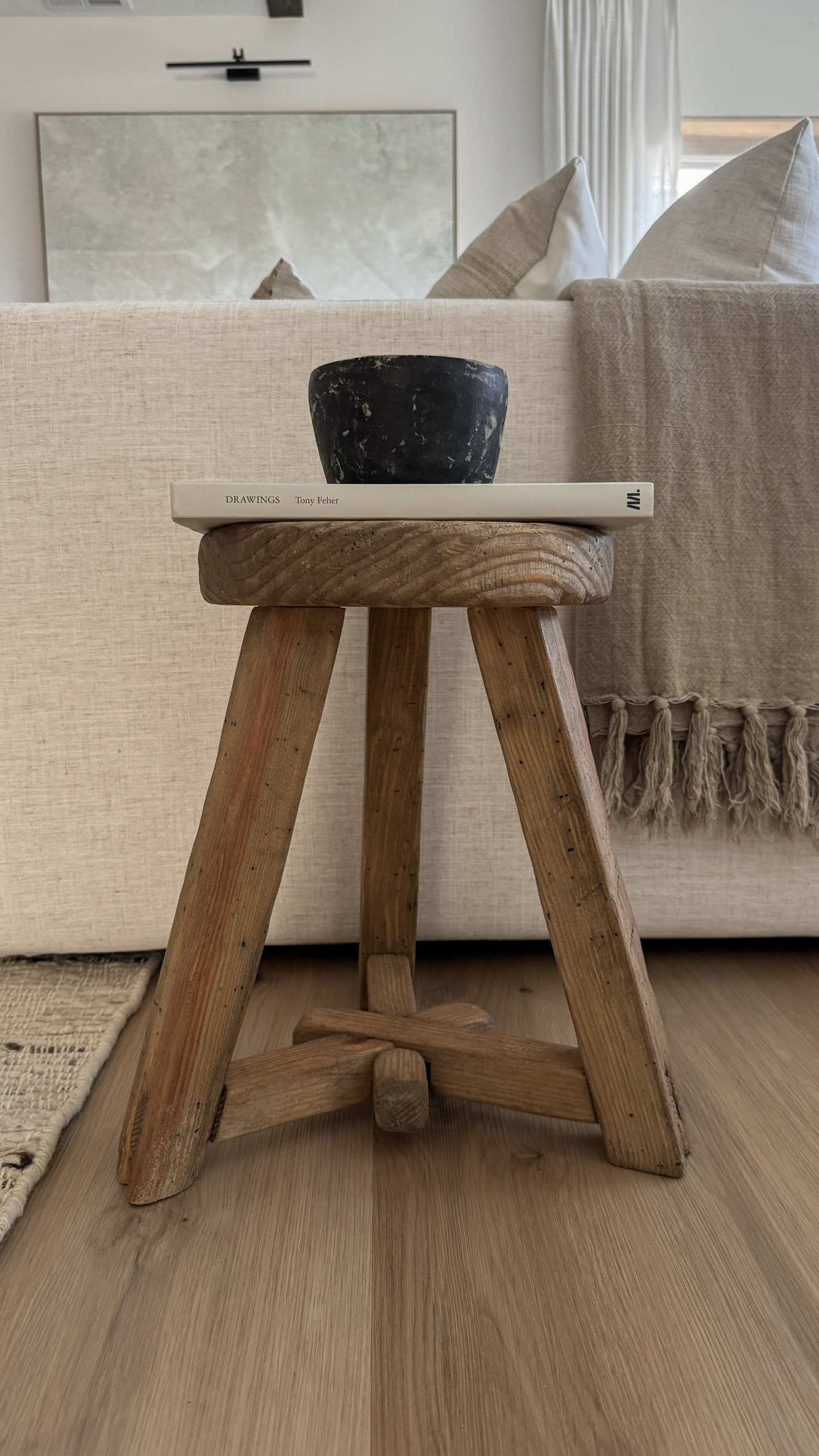 A favorite styling combo in my home — a vintage-inspired stool, a textured black bowl, and a neutral coffee table book. This setup adds contrast and character to any corner, while staying true to a minimal earthy home decor vibe. Perfect for accenting neutral modern home decor ideas or layering into an organic modern living room. 

 

#LTKHome