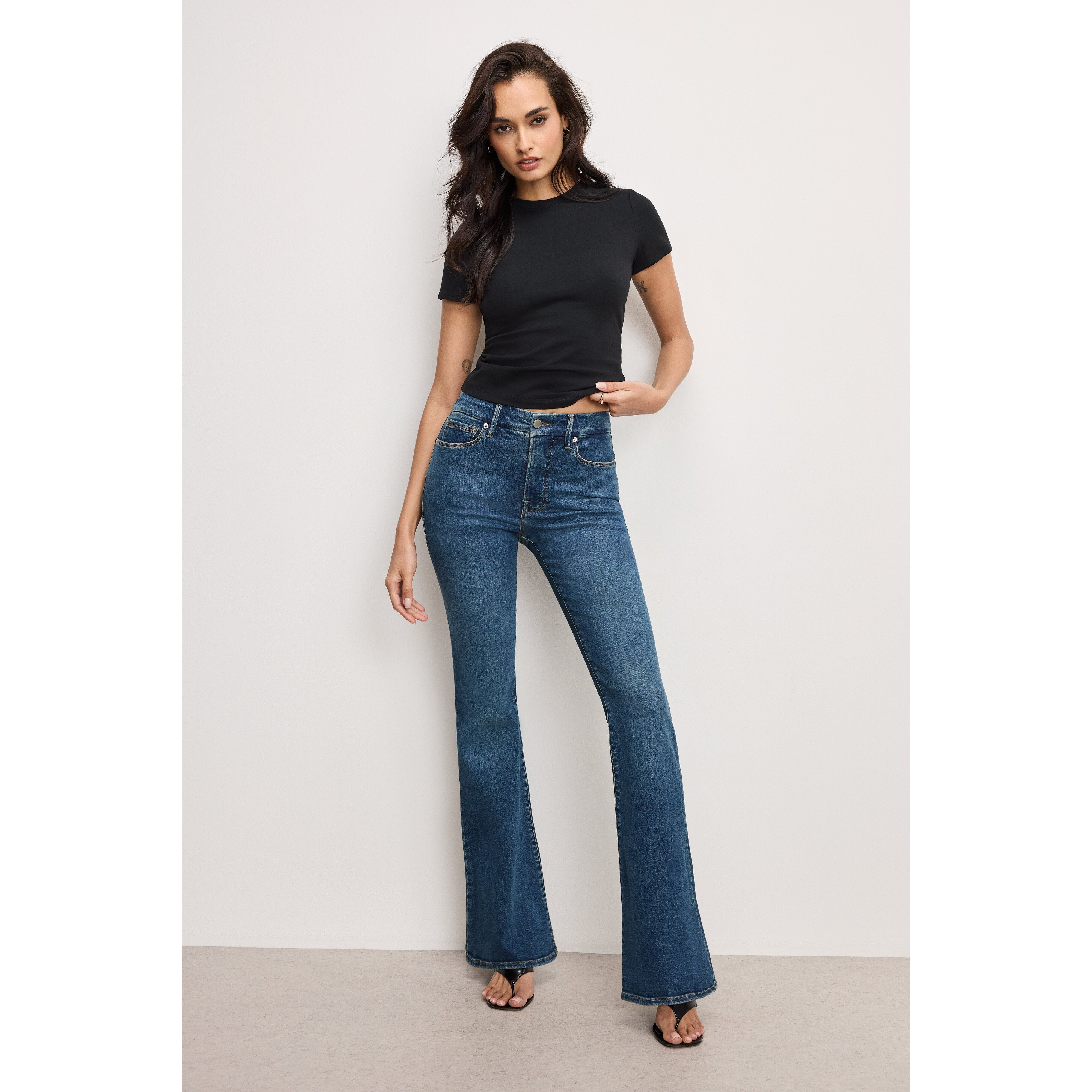 Women's Good Legs Flare Jeans | Extra Stretch, Flat Tummy Tech, Gap-Proof Waistband Long | Blue, Size 15 Plus | Good American by | Good American
