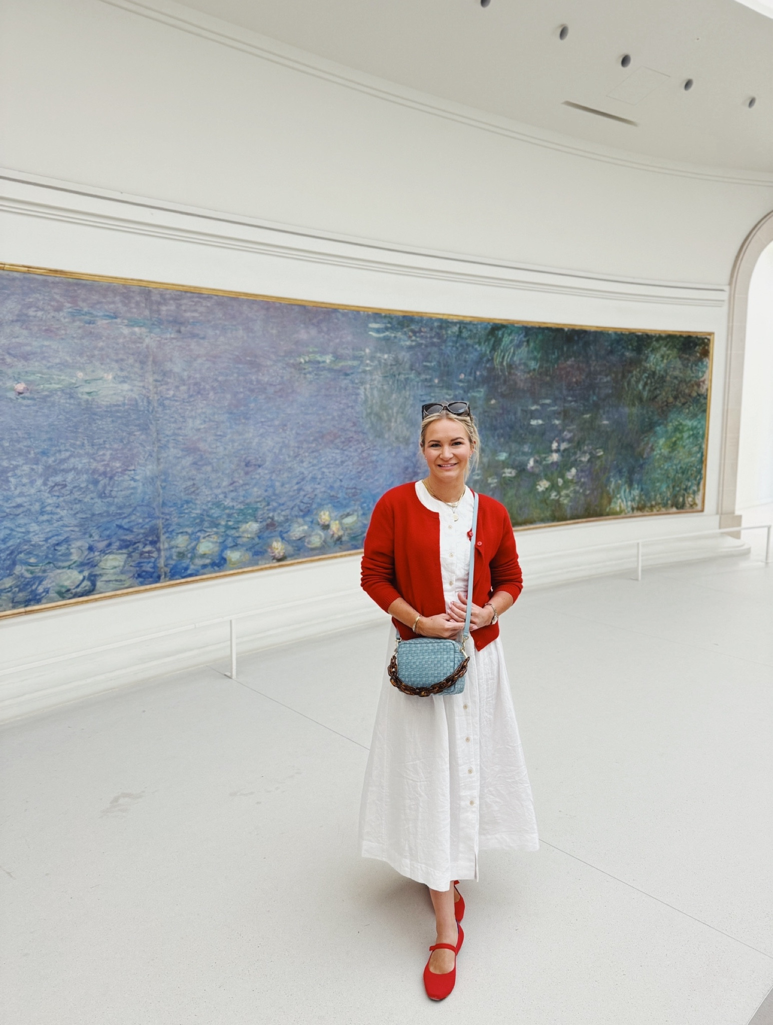 Walking through Paris! 🇫🇷 this cherry red cardigan and mary Jane’s were the perfect compliment to this day dress! #parisfrance #cherryred #maryjanes #traveloutfit
