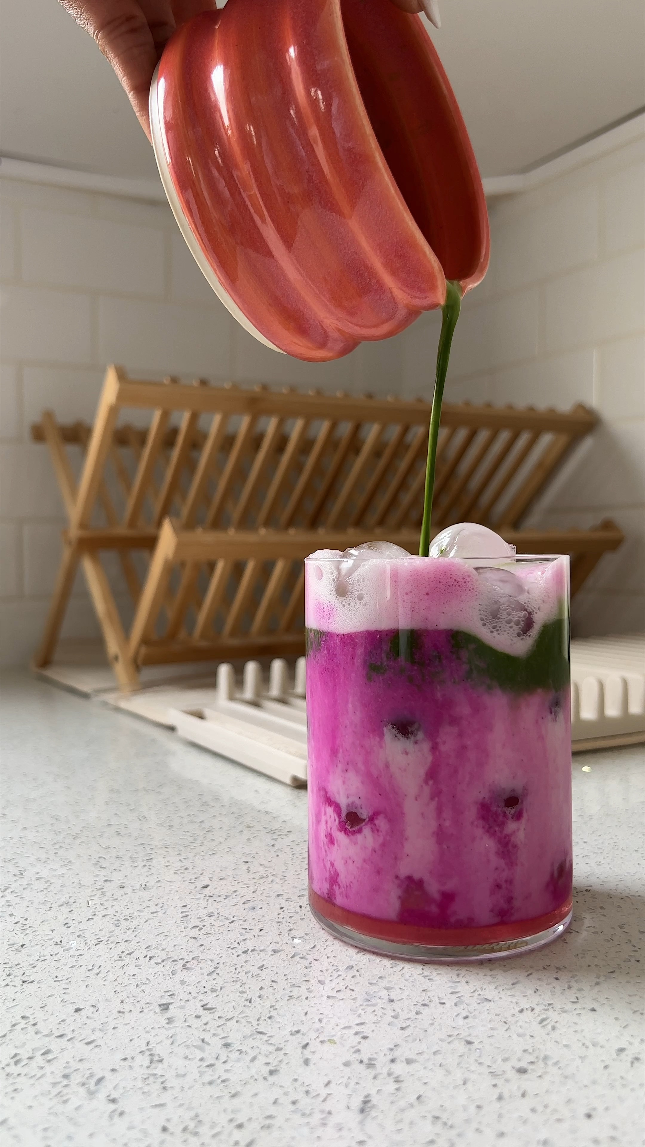 Dragon fruit rose matcha latte 💕

full recipe: 
• boil water to 185° 
• 1/2 @pitpayafoods dragon fruit smoothie pack
• add 2oz oat milk
• blend until liquid
• sift 1/2 tsp matcha powder 
• pour 2-3 oz. warm water in bowl
• whisk mixture for 30 seconds 
• fill glass with ice
• pour 1tbsp rose @monin_usa syrup
• pour dragon fruit puree
• add 3-4oz of oat milk 
• add matcha 
• add dried rose petals for garnish
• stir, sip & enjoy 

everything used: 
• tea kettle from @amazonlifetstyle 
• blender from @beasthealth
• dragon fruit smoothie packs from @pitpayafoods
• pure matcha from @golde
• ceramic bowl from @golde x @earthandherflowers 
• glass from @crateandbarrel
• glass straw from @amazonlifestyle
• sifter & scooper from @amazonlifestyle 


#LTKhome