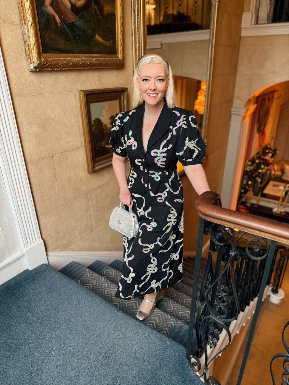 This is the new Sister Jane Ripple Bow Embellished Midi Dress from their Showgirls collection! I absolutely love the puff sleeves, crystal buttons and iridescent sequin ribbon bows. I styled with past accessories, but take a look at the product list for plenty of accessory ideas from current collections!

Silver Shoes - Alohas 
Silver Mini Holly Bag - Tusting
Silver Headband - H&M

#LTKeurope #LTKfestive #LTKwinter