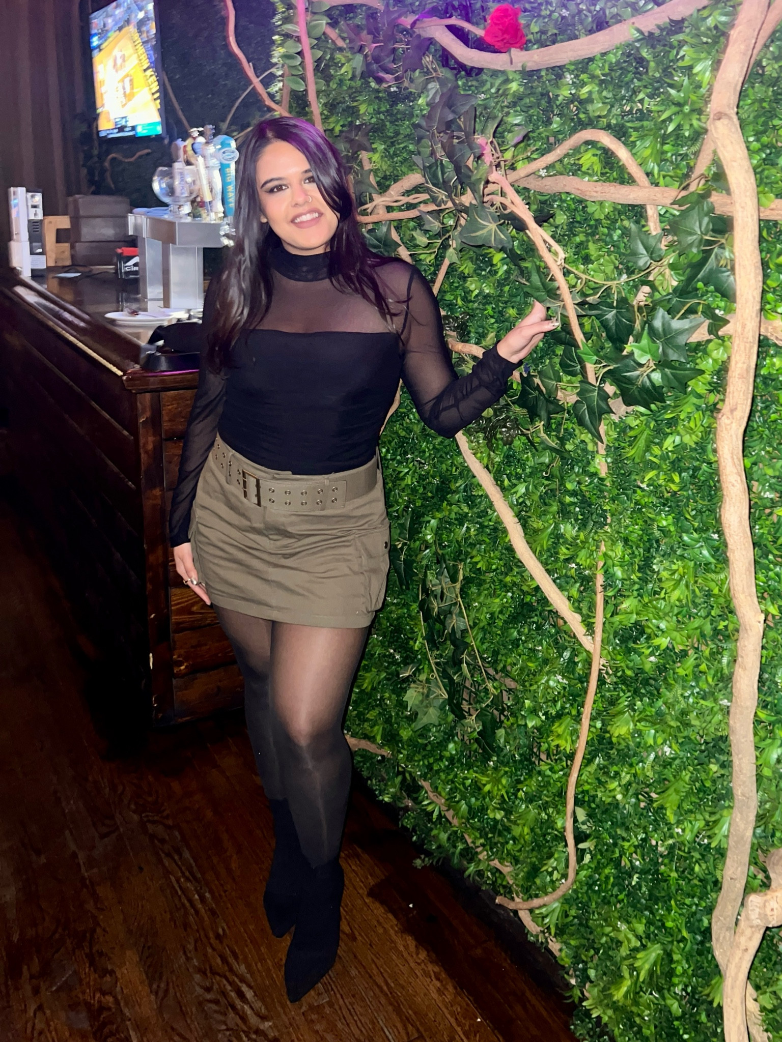 Elevate your black bodysuit with this green mini skirt and sheer tights! 

The mesh sleeves go well with sheer tights (which I wore all day and they didn’t rip 🥳)

The stockings come in a set of three - I’m a size 8 so I got a large.

The skirt is from Shop Cider and it’s a cargo style mini skirt with a belt.

These ankle boots over leather boots because it‘s giving chic 💅

Valentines day outfit? 🫦

🖤🤍🖤🤍

#LTKparties #LTKstyletip #LTKmidsize