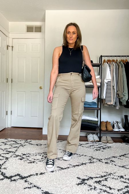 Casual outfit idea. Summer outfit idea. Tank too bodysuit. Khaki cargo pants. Converse. 

Sizing
Bodysuit is a medium.
Pants are a 6 Tall (a size up from my usual size 4, but I would suggest going up to sizes, as these are really snug).
Converse run TTS.

#LTKstyletip #LTKunder100 #LTKunder50