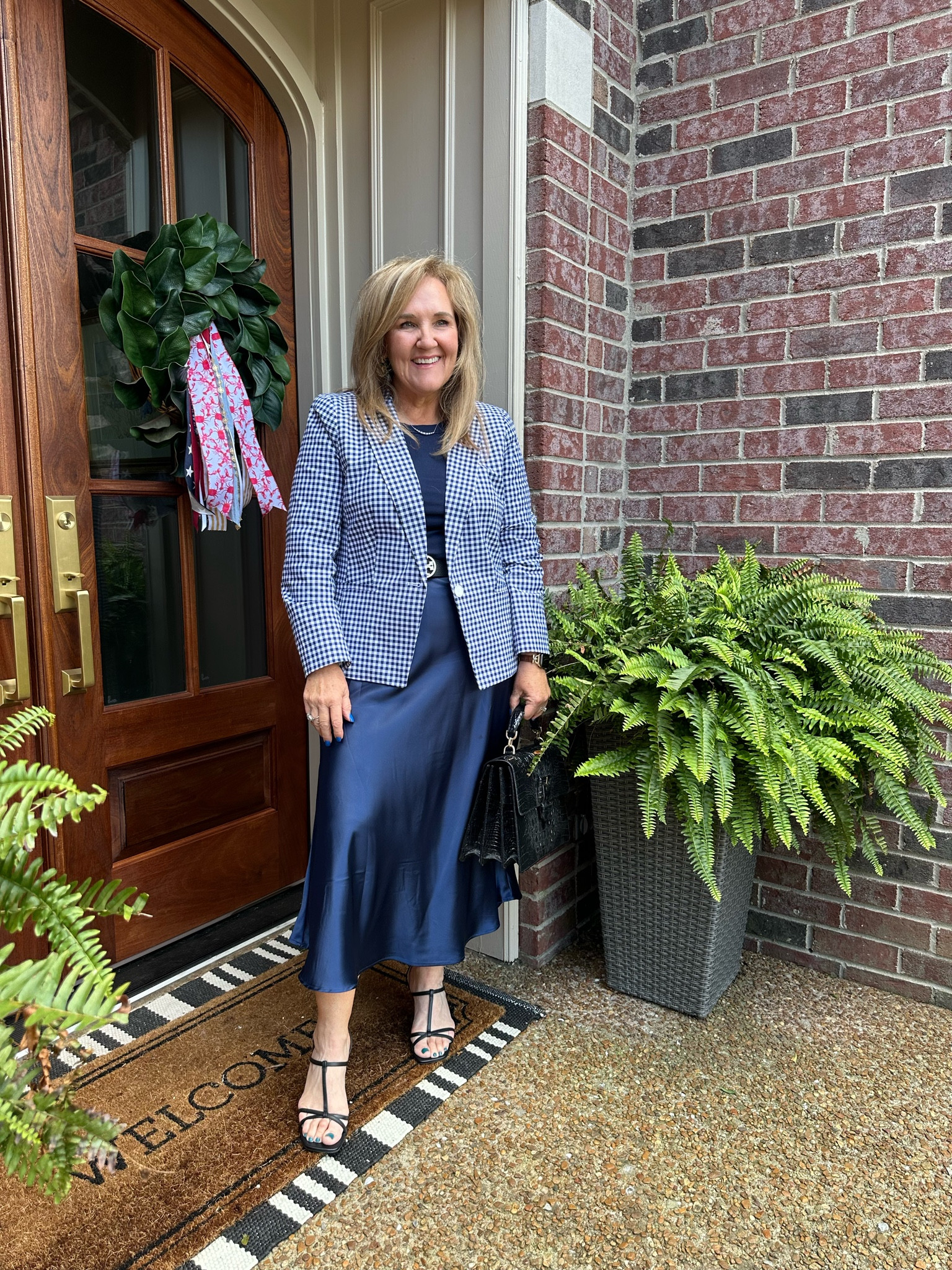 Grab this gingham blazer for work, church, conferences and it’s look great casual with jeans! I’m in a 14 petite. Def go your larger size. 
Satin slip skirt runs tts. Elastic waist. 
I snag a few of the perfect tanks from loft each season. They’re so good. I size up. 

Talbots sale work outfit church outfit Amazon skirt gingham blazer navy 

#LTKSaleAlert #LTKWorkwear #LTKFindsUnder100