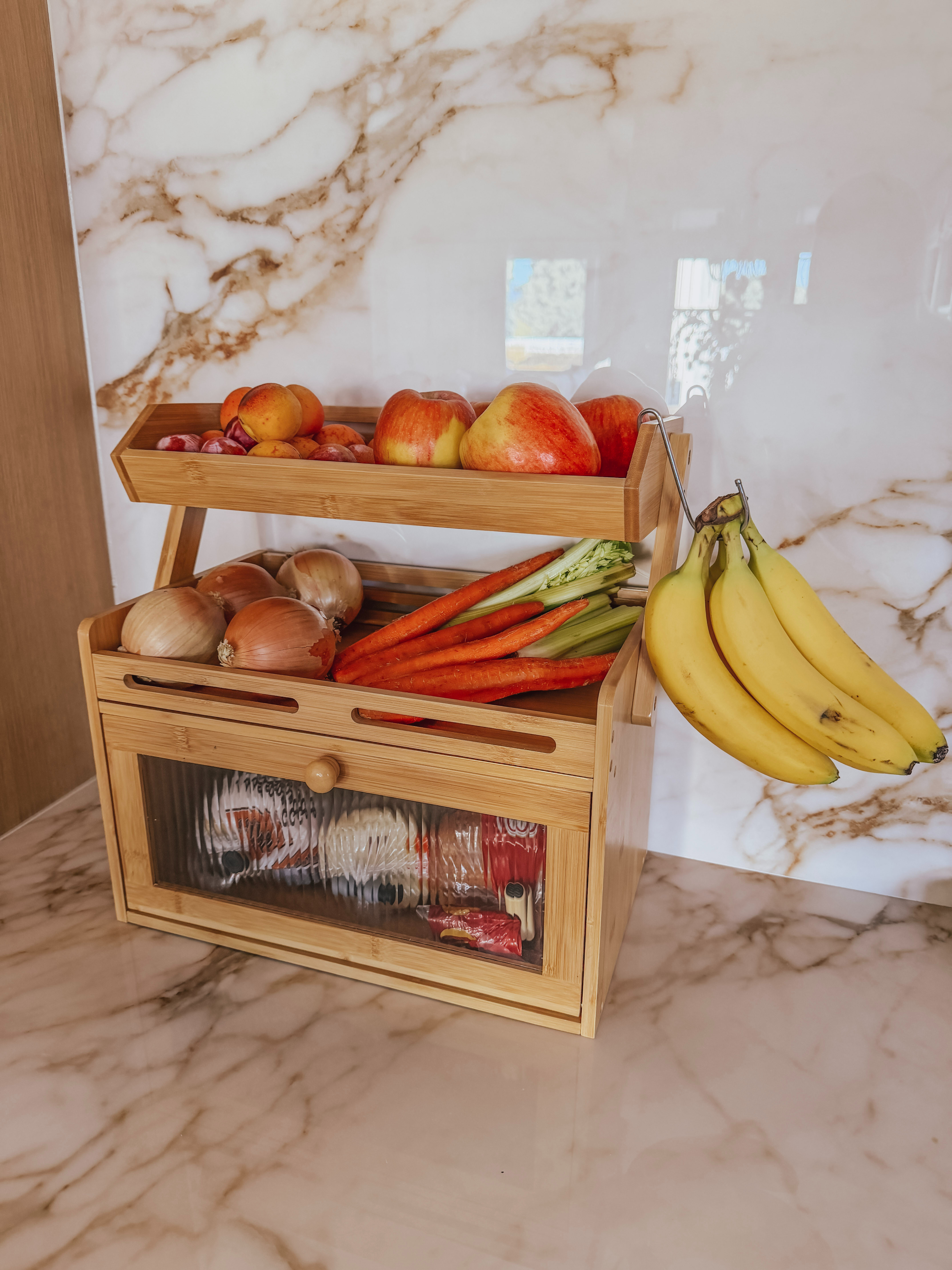 This bamboo bread box is a cute countertop upgrade that keeps bread tucked away while adding extra produce storage on top. 🍞✨ It’s a smart way to keep your kitchen organized, your counters less cluttered, and your everyday essentials within easy reach. 

 #LTKfoodie #LTKHome